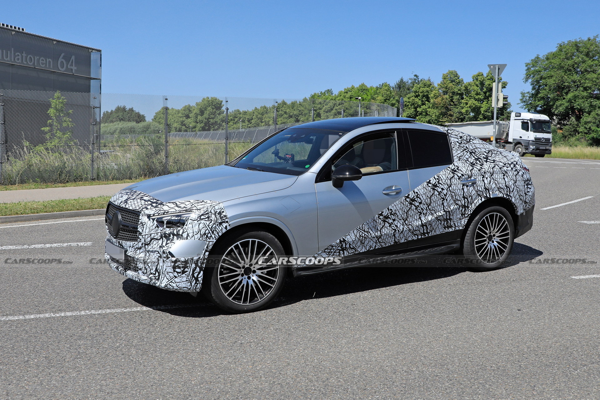 Style-Driven 2024 Mercedes-Benz GLC Coupe Spied Flaunting Its Sloping Roofline