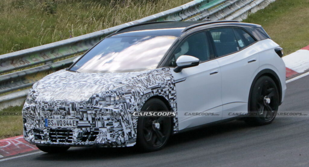  Cupra Tavascan Electric SUV Mule Caught Testing At The Nurburgring