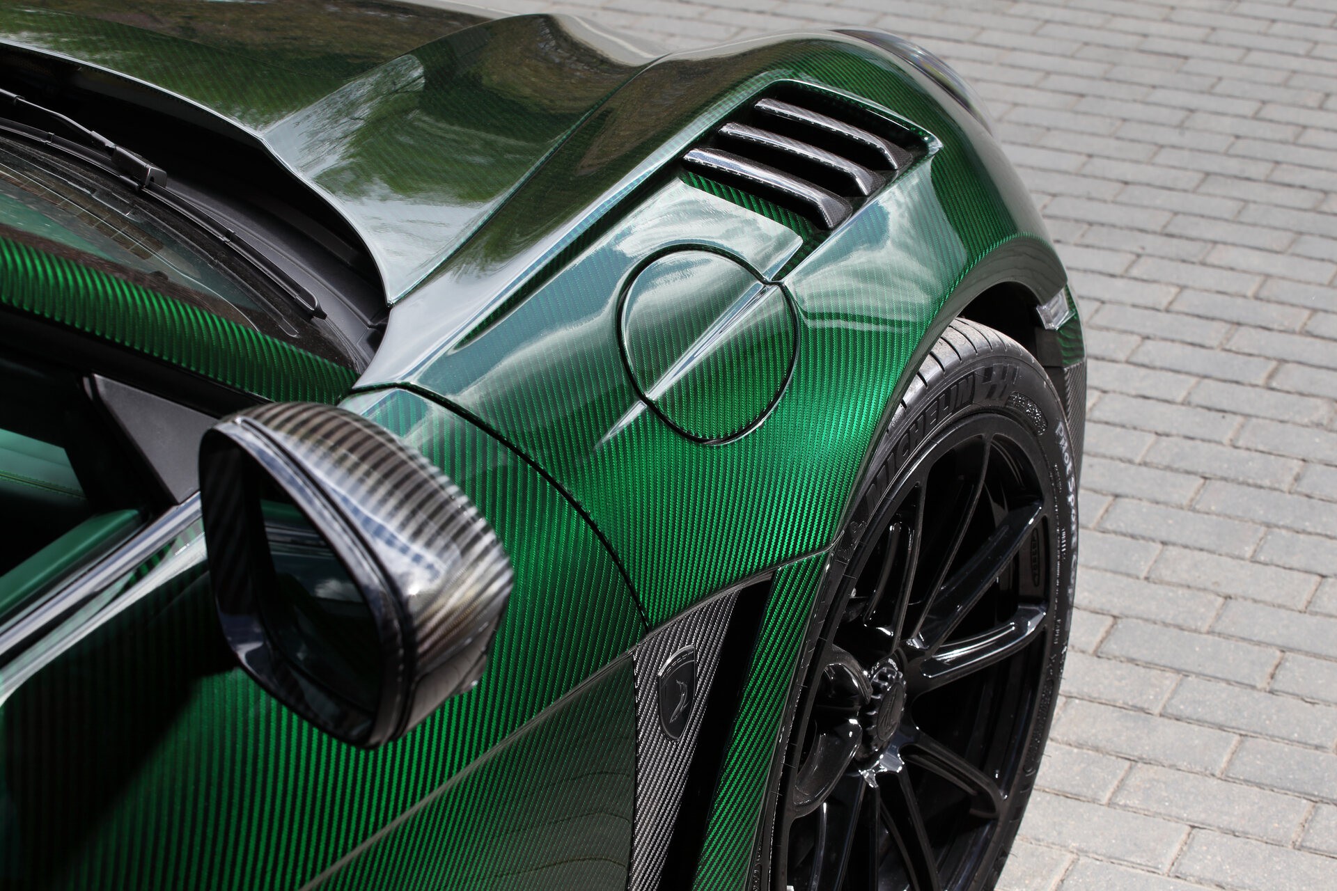 This Porsche 911 Turbo S From TopCar Is Wearing Nothing But Green Carbon Fiber