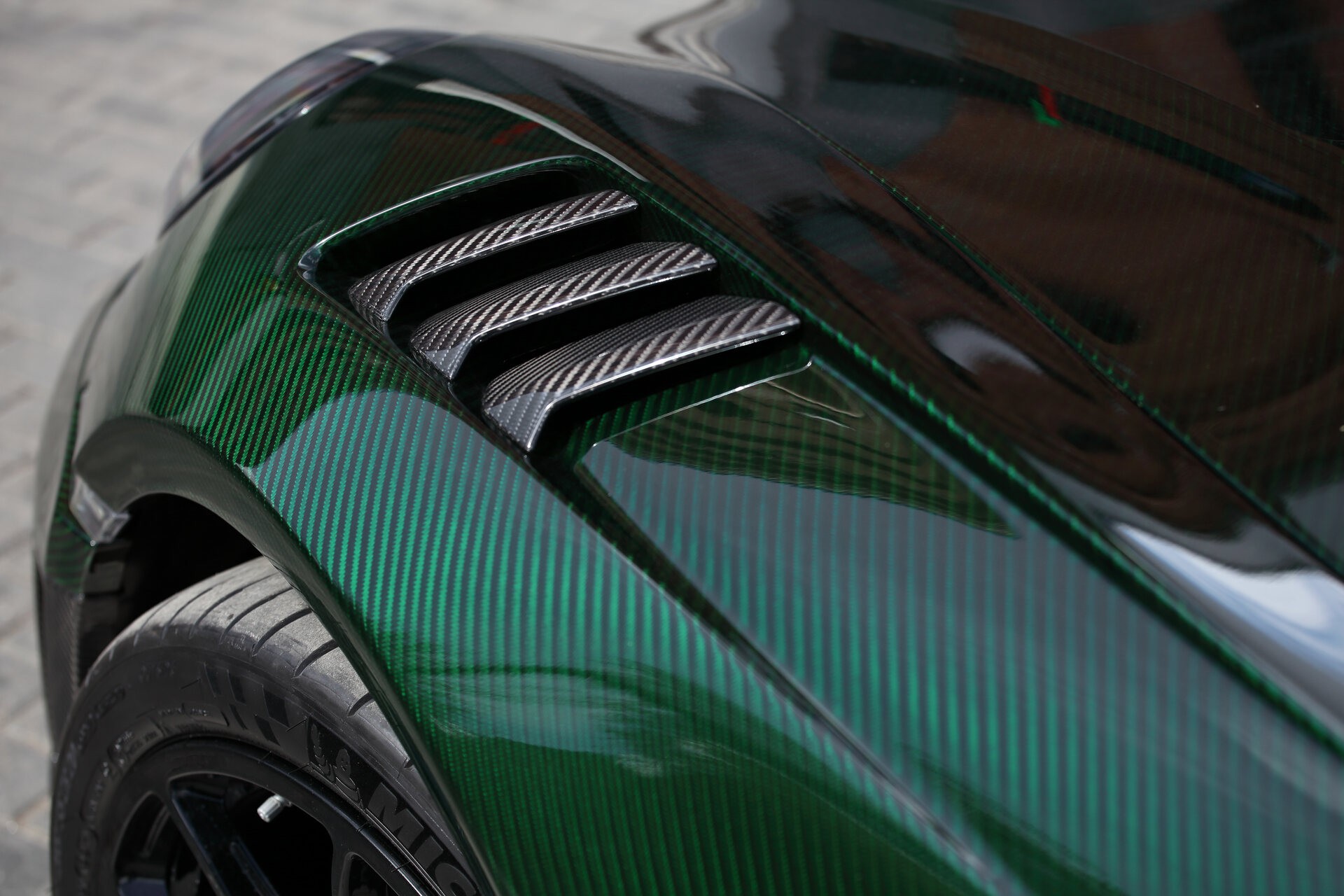 This Porsche 911 Turbo S From TopCar Is Wearing Nothing But Green Carbon Fiber