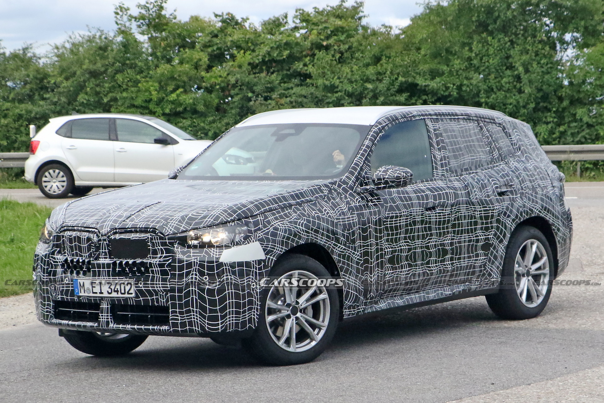 2024 BMW X3 Spied Again Still Wearing Heavy Camouflage