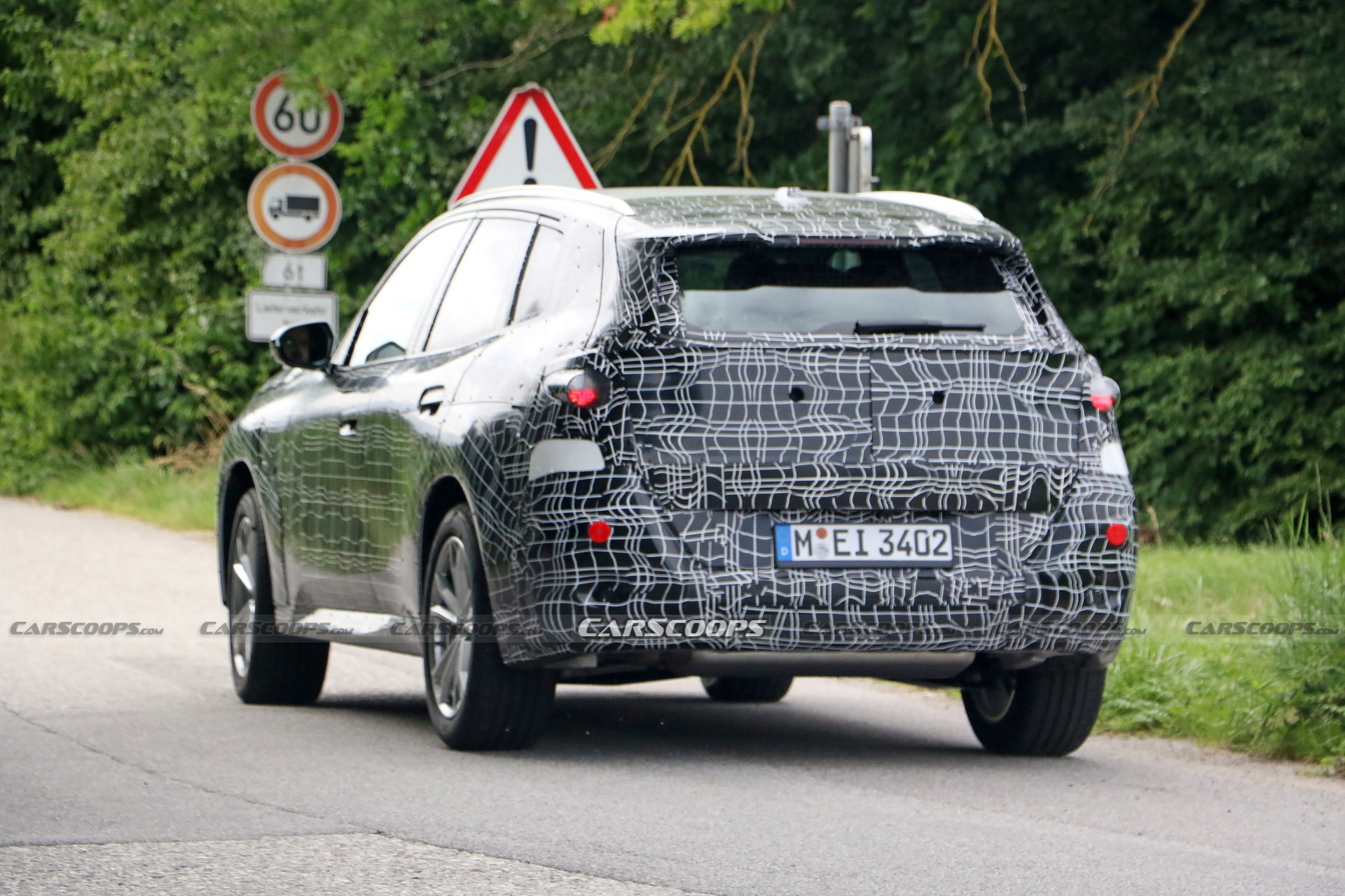 2024 BMW X3 Spied Again Still Wearing Heavy Camouflage
