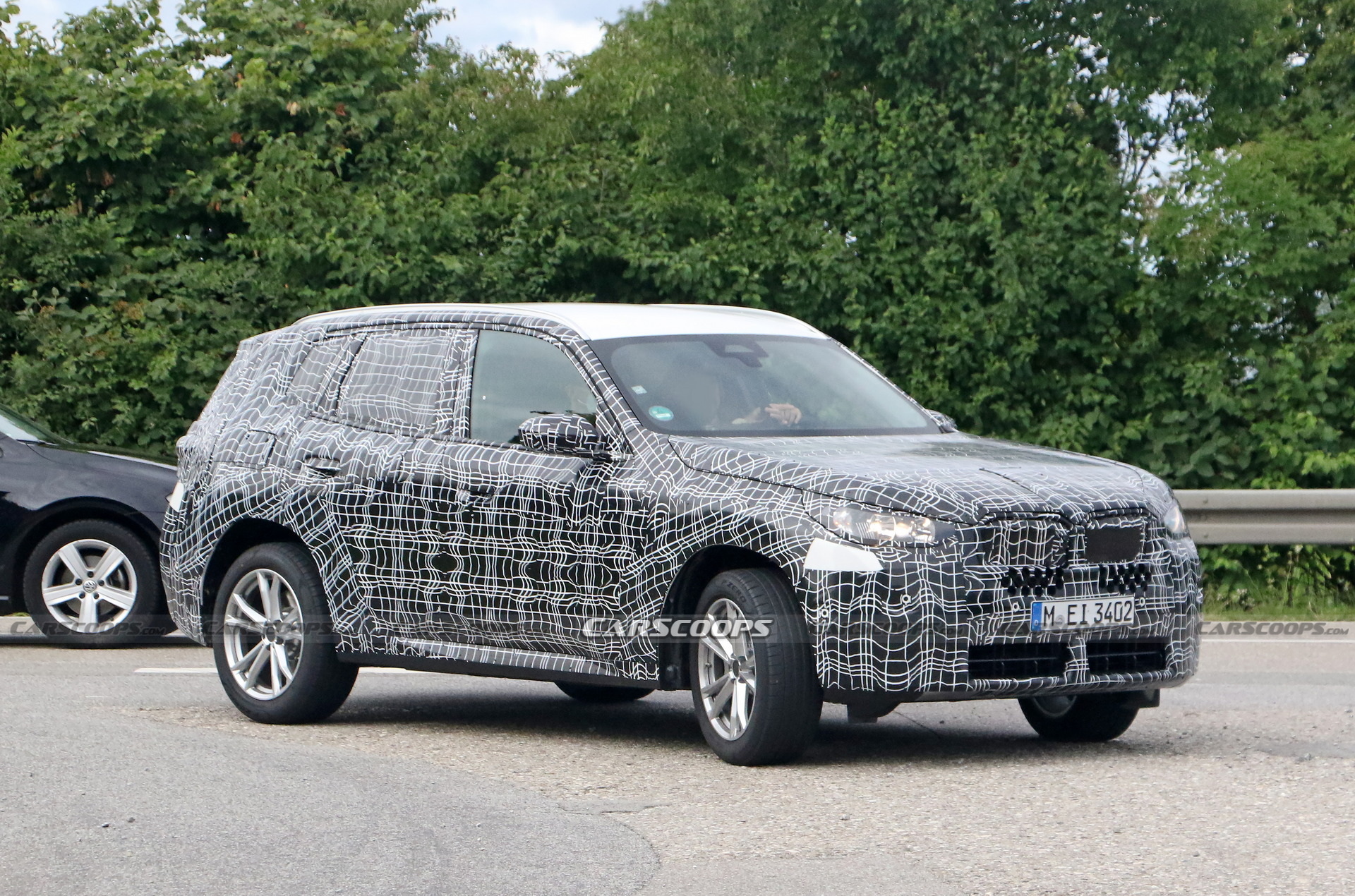 2024 BMW X3 Spied Again Still Wearing Heavy Camouflage