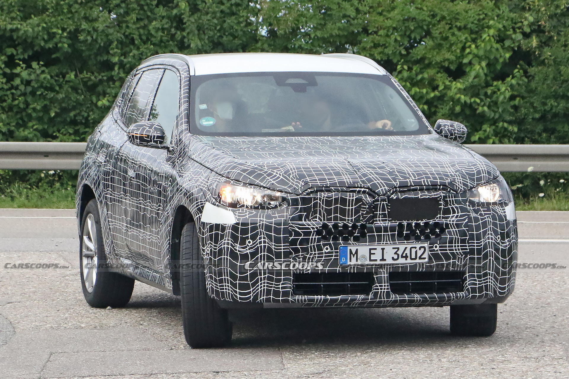 2024 BMW X3 Spied Again Still Wearing Heavy Camouflage
