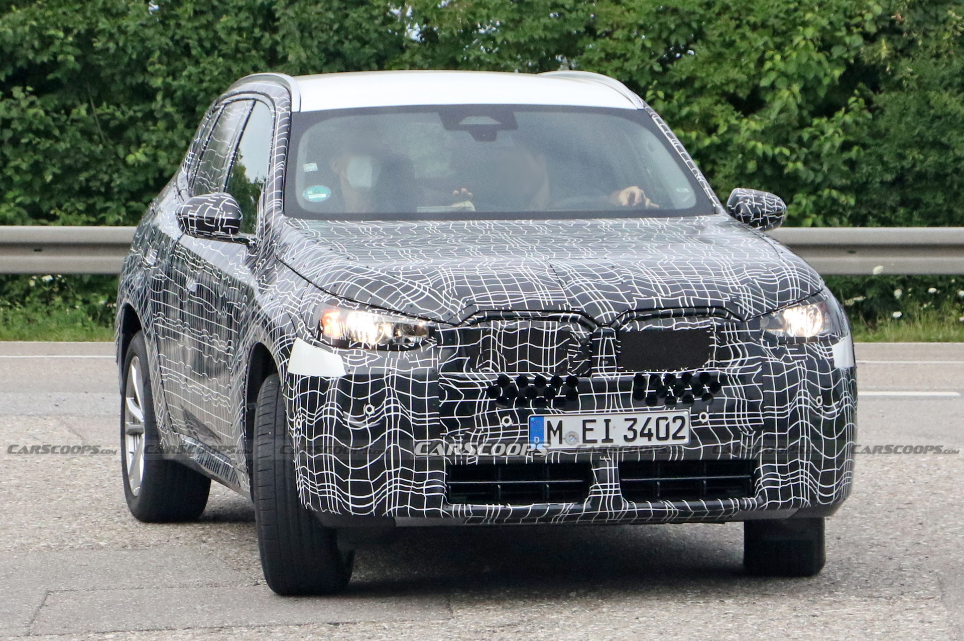 2024 BMW X3 Spied Again Still Wearing Heavy Camouflage