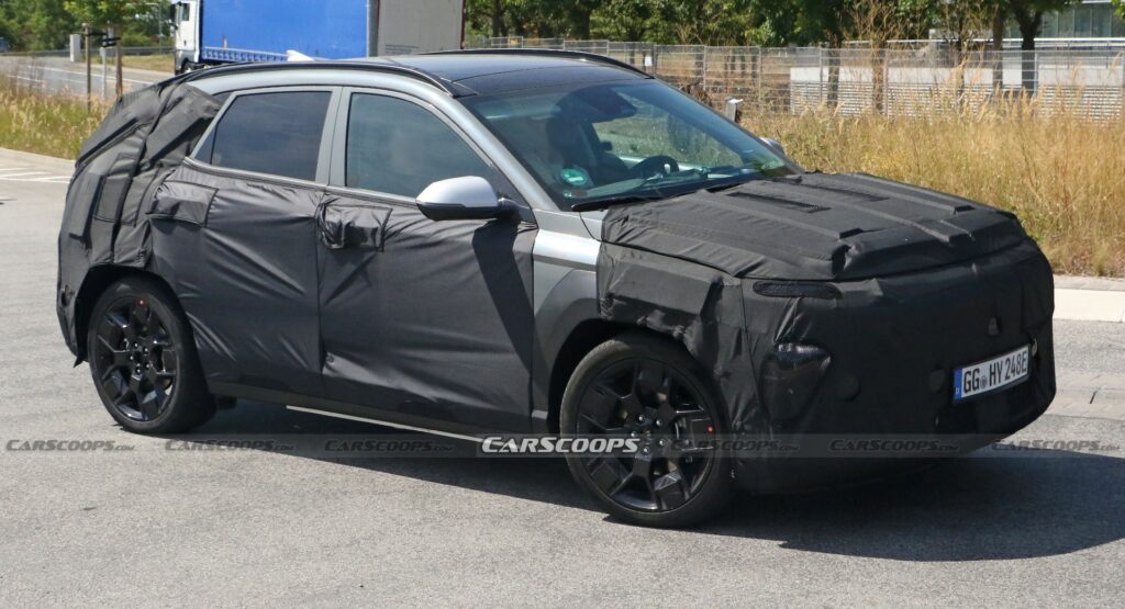  2024 Hyundai Kona Electric Spotted During Testing Under Heavy Camouflage