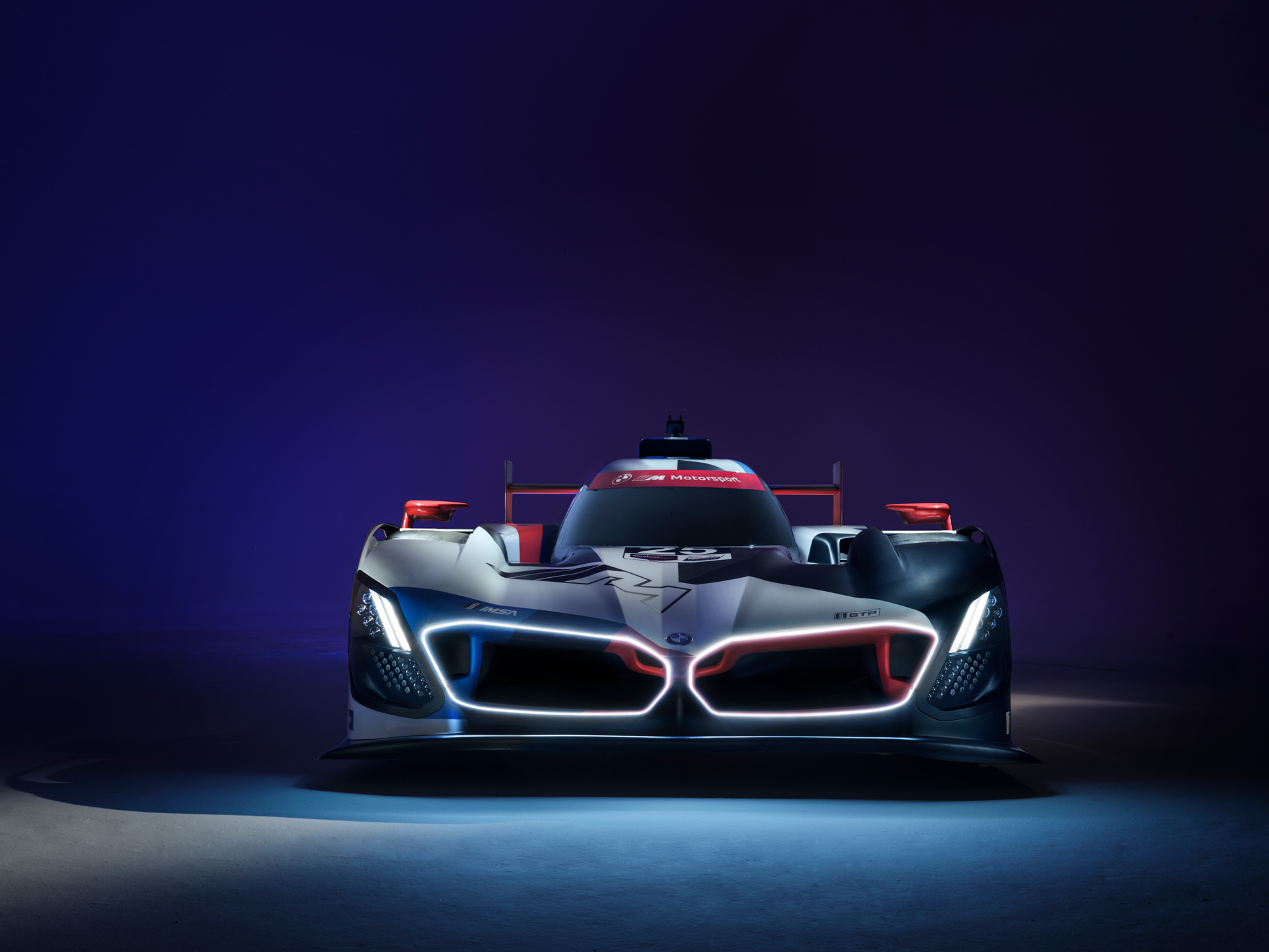2023 BMW M Hybrid V8 Revealed In Full Motorsport Livery And A Larger Than Life Illuminated Grille