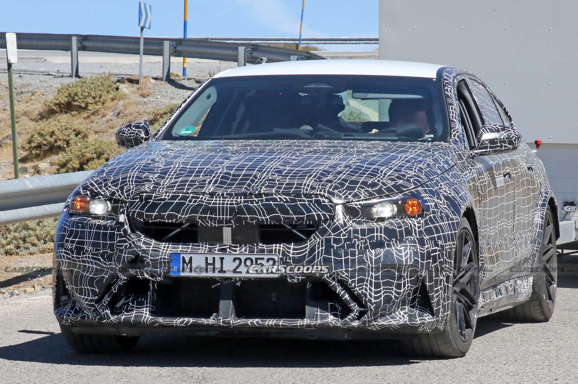 Get A Look At The 2024 BMW M5 Hybrid’s Air-Hungry New Bumper While Towing A Trailer