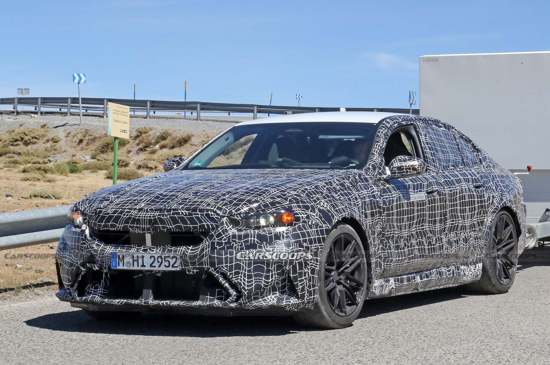 Get A Look At The 2024 BMW M5 Hybrid’s Air-Hungry New Bumper While Towing A Trailer