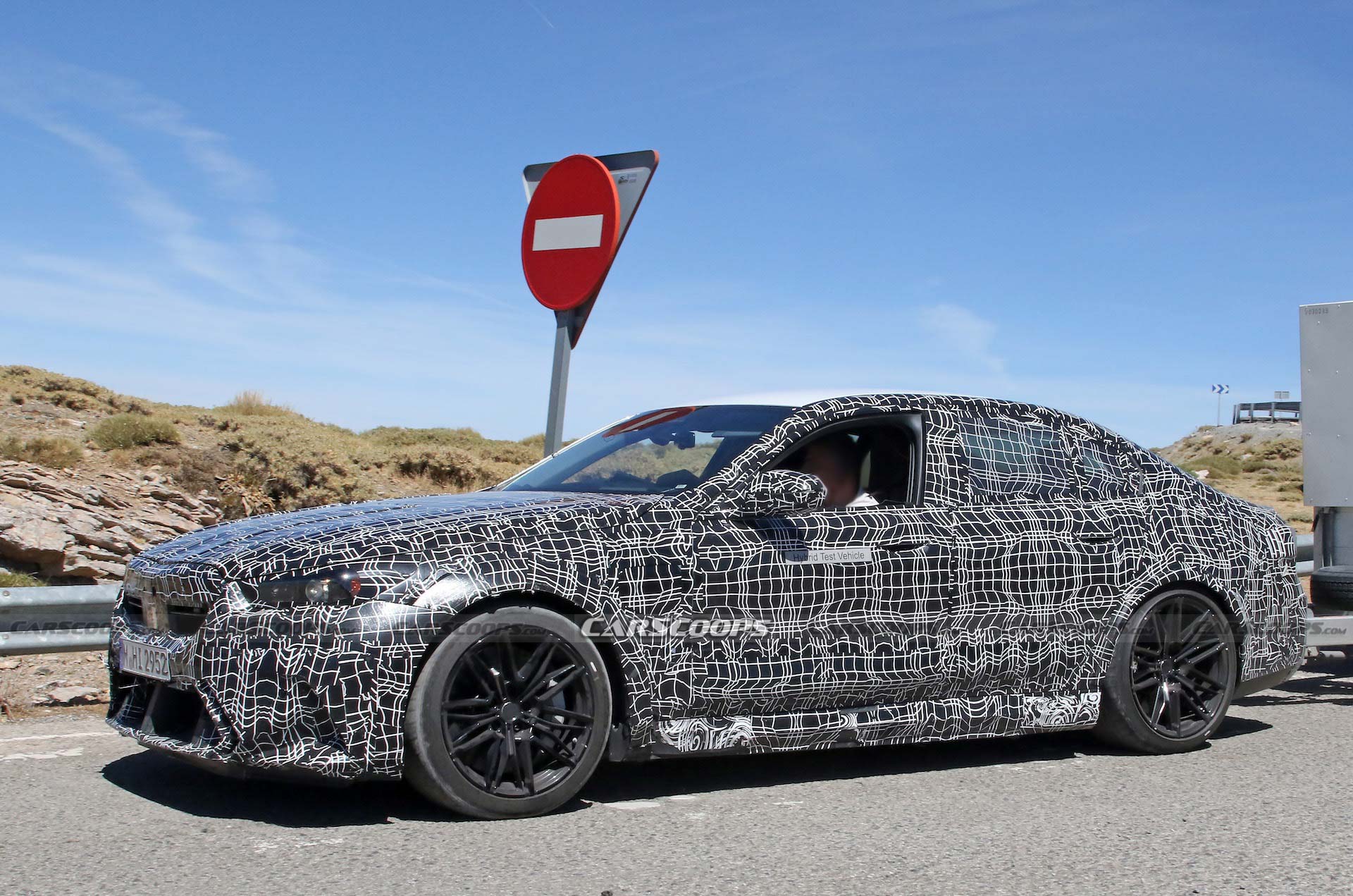 Get A Look At The 2024 BMW M5 Hybrid’s Air-Hungry New Bumper While Towing A Trailer