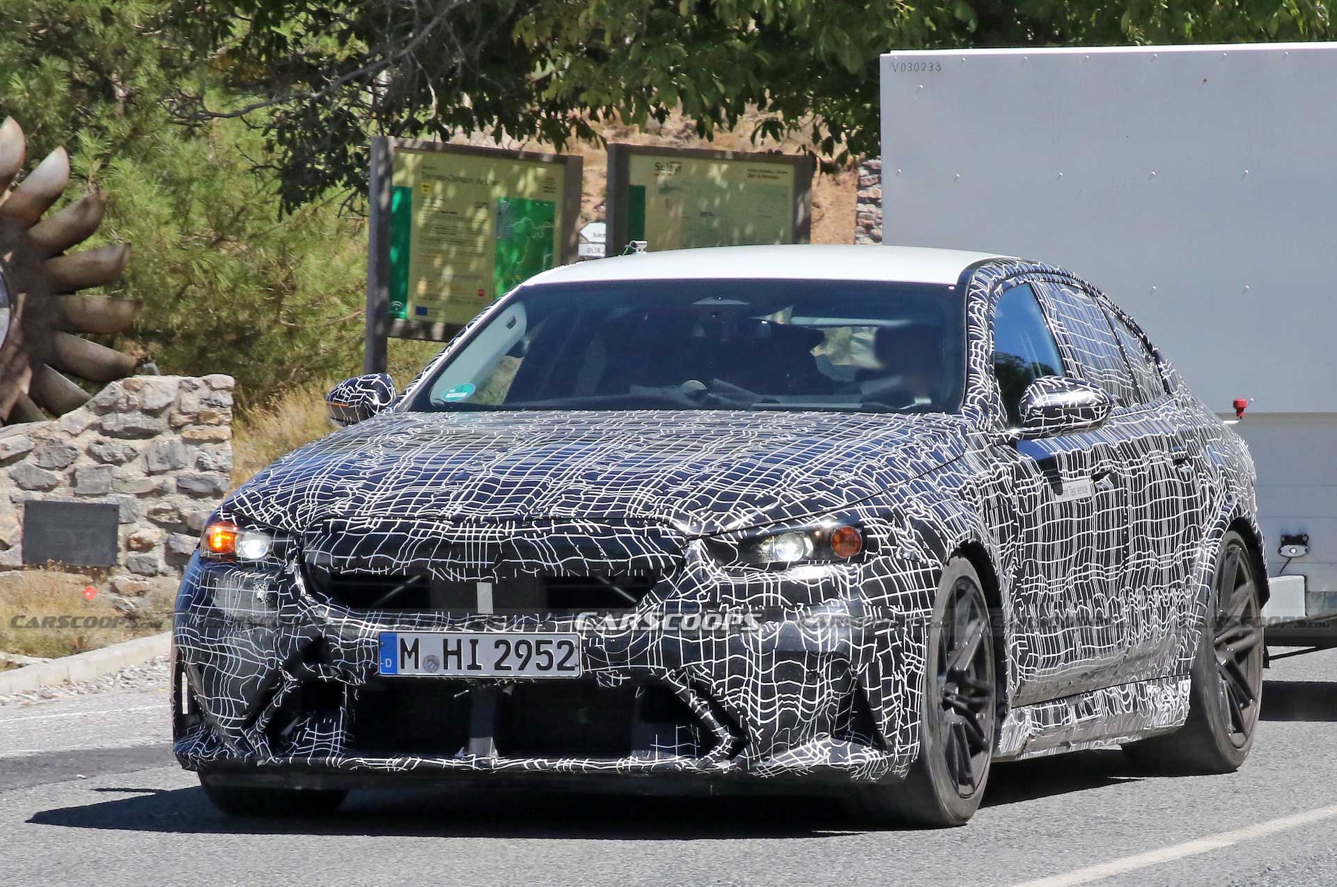 Get A Look At The 2024 BMW M5 Hybrid’s Air-Hungry New Bumper While Towing A Trailer