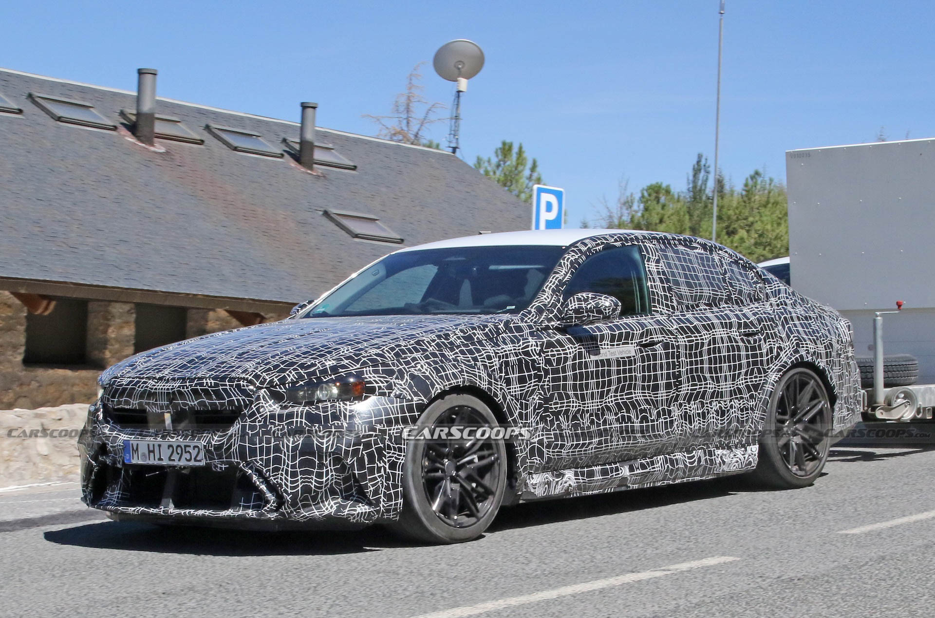 Get A Look At The 2024 BMW M5 Hybrid’s Air-Hungry New Bumper While Towing A Trailer