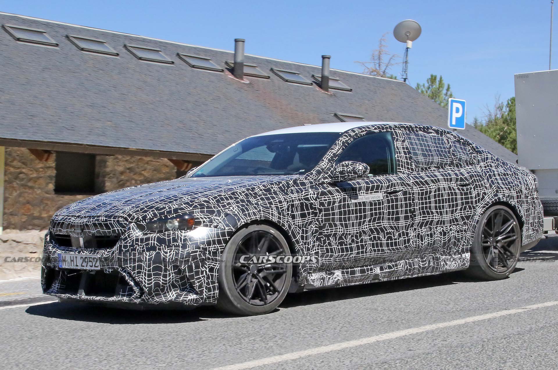 Get A Look At The 2024 BMW M5 Hybrid’s Air-Hungry New Bumper While Towing A Trailer