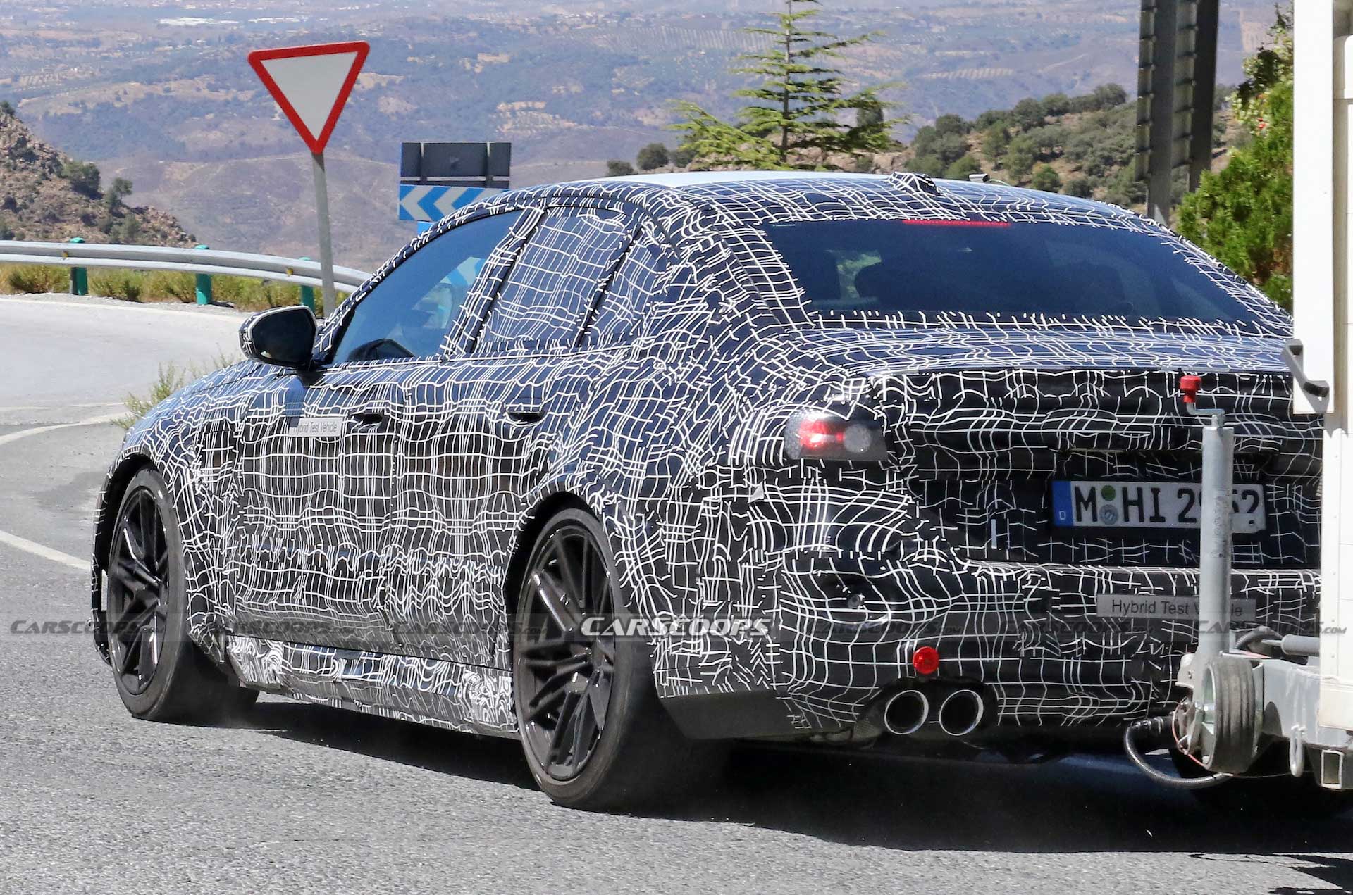 Get A Look At The 2024 BMW M5 Hybrid’s Air-Hungry New Bumper While Towing A Trailer