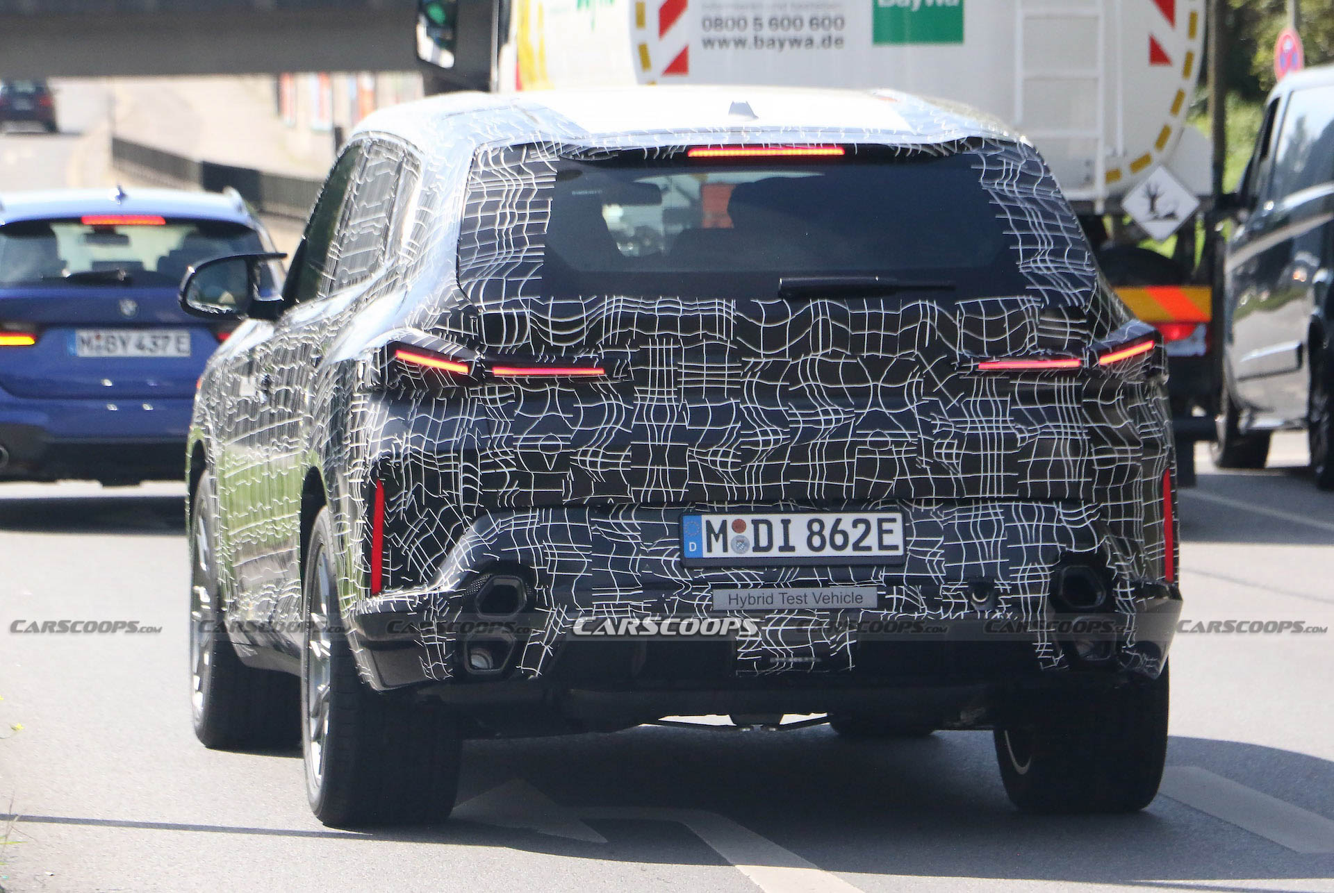 Still-Camo’d BMW XM Prototype Pretends We Haven’t All Seen The Leaked Patent Drawings