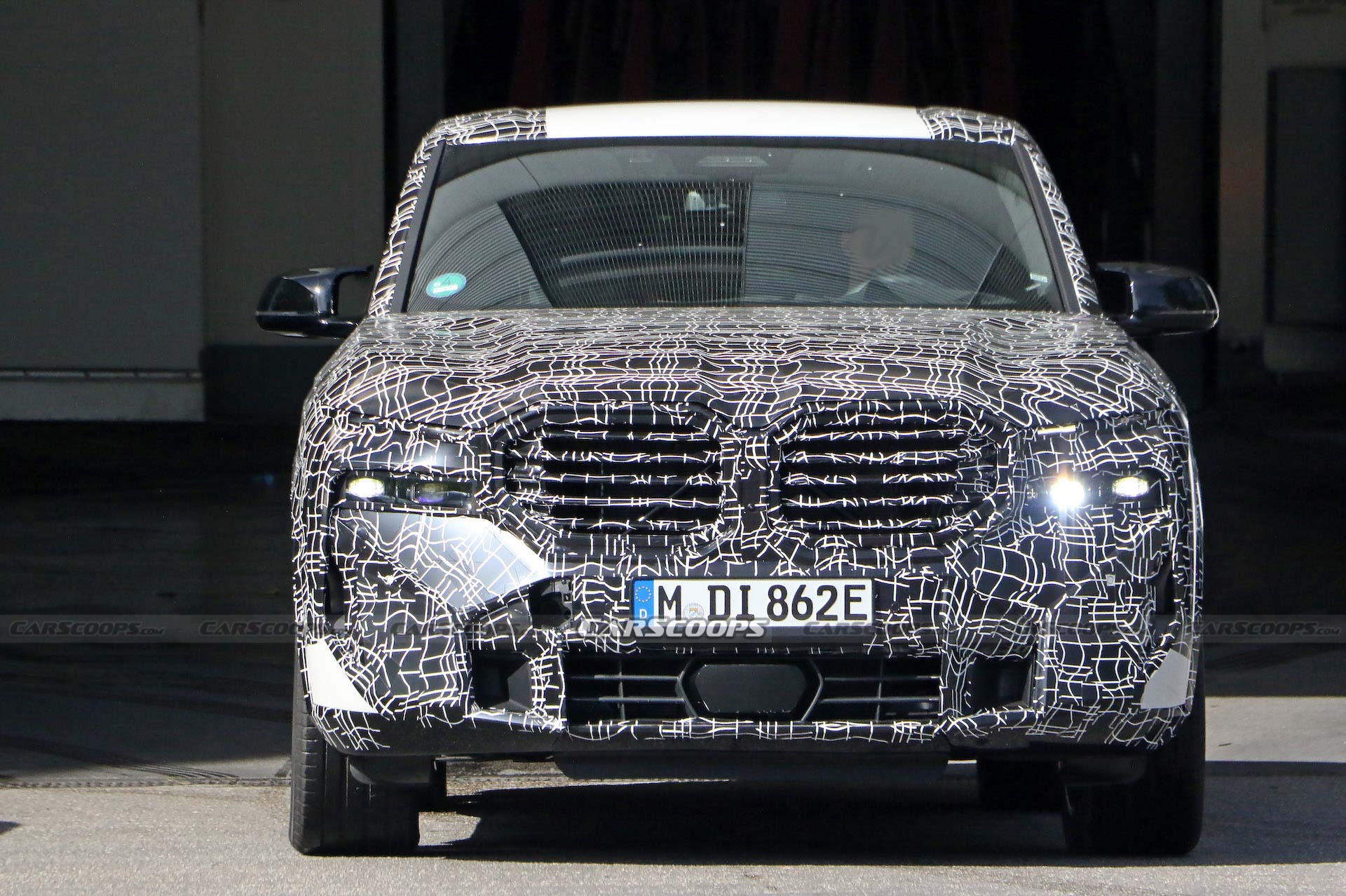 Still-Camo’d BMW XM Prototype Pretends We Haven’t All Seen The Leaked Patent Drawings