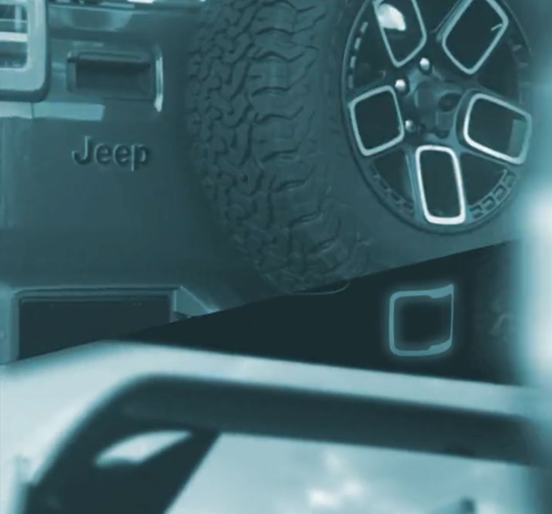 Jeep Appears To Be Teasing A New EV With An Illuminated Seven-Slot Grille