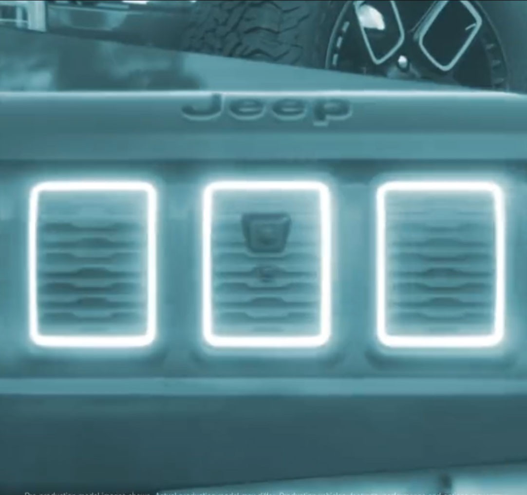 Jeep Appears To Be Teasing A New EV With An Illuminated Seven-Slot Grille