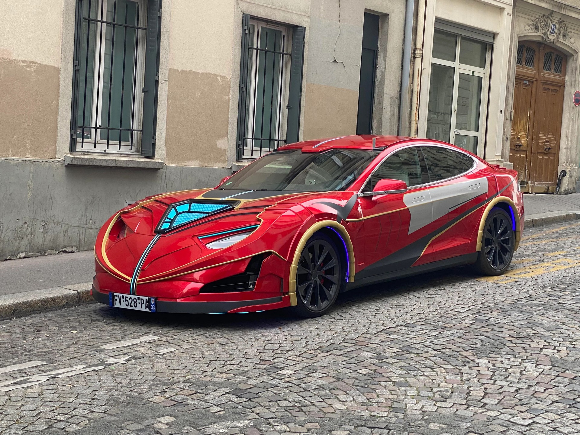 This Tesla Model S Owner Is Either A Huge Fan Of Iron Man Or The Pontiac Sunfire