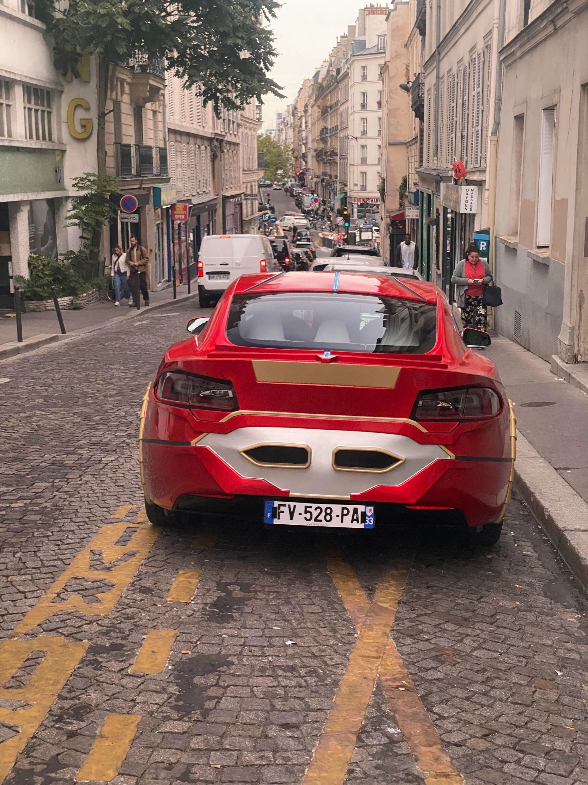 This Tesla Model S Owner Is Either A Huge Fan Of Iron Man Or The Pontiac Sunfire