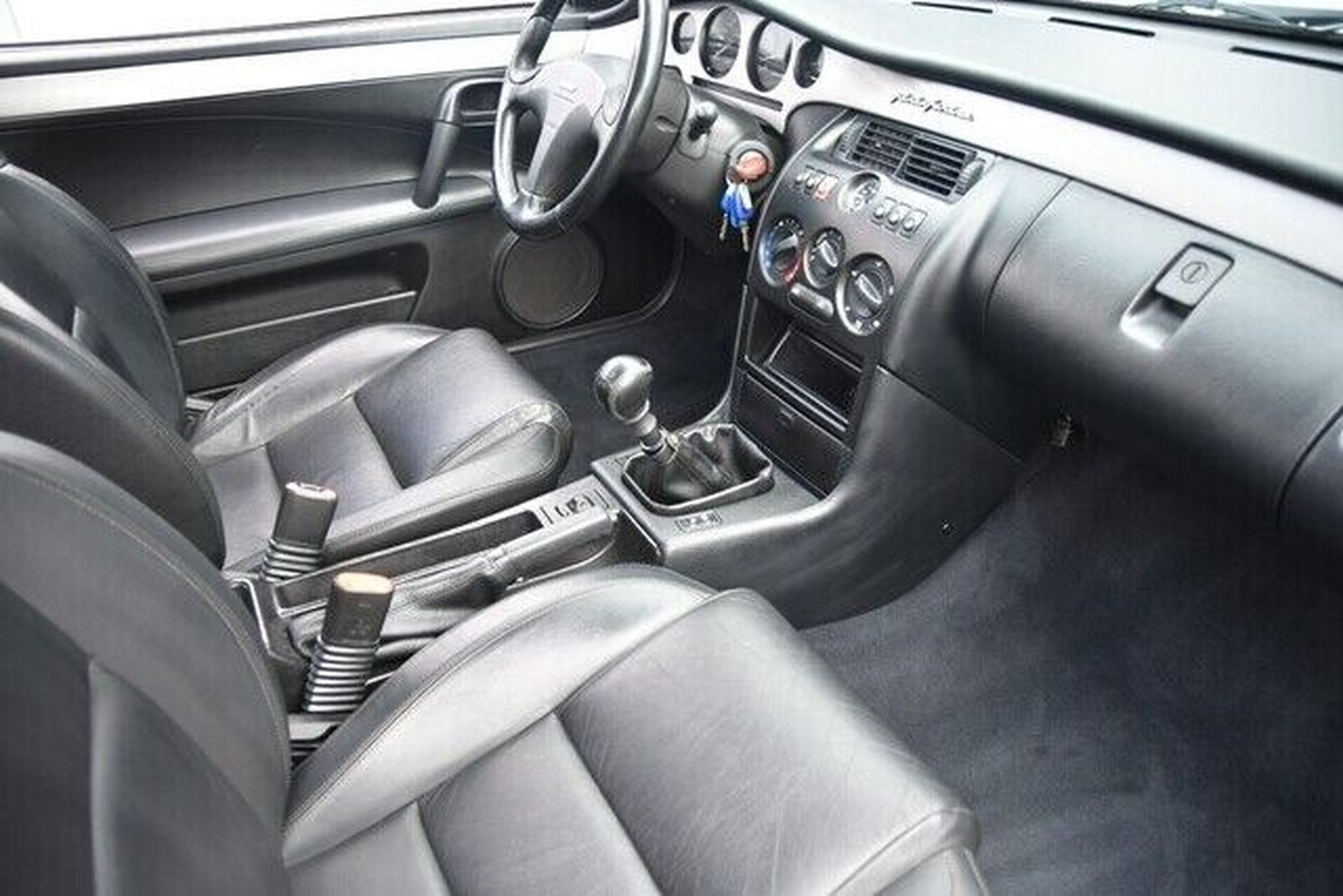 For $18k, You Can Rock Chris Bangle’s Poor Man’s Ferrari Coupe From Fiat