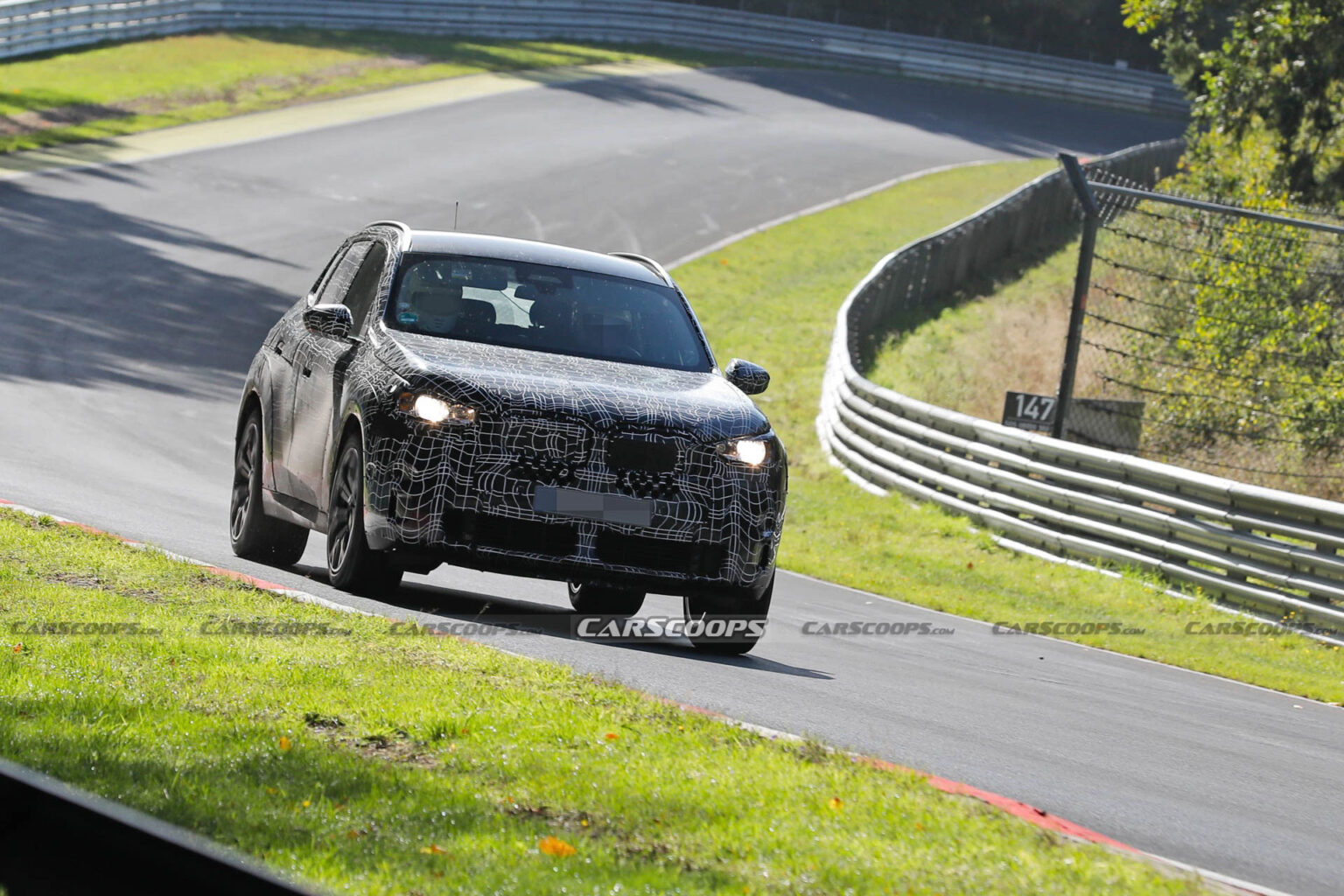 2024 BMW X3M Can’t Hide Its Big Grille Behind Disguise | Carscoops