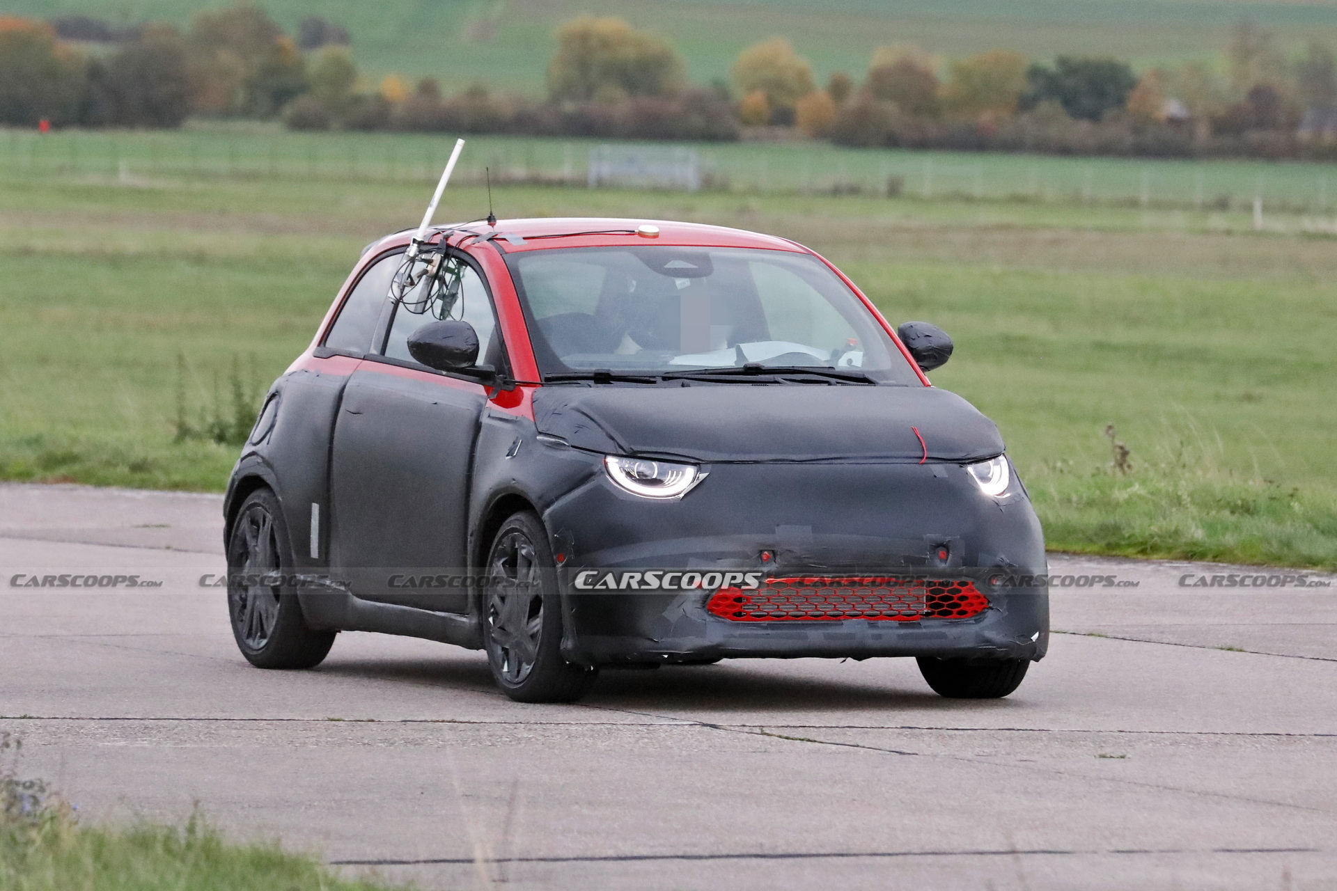 Abarth Version Of The Fiat 500 EV Spied Trying To Hide Its Redesigned Bodykit