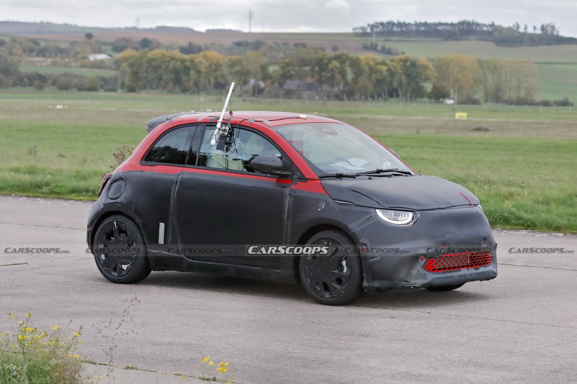 Abarth Version Of The Fiat 500 EV Spied Trying To Hide Its Redesigned Bodykit