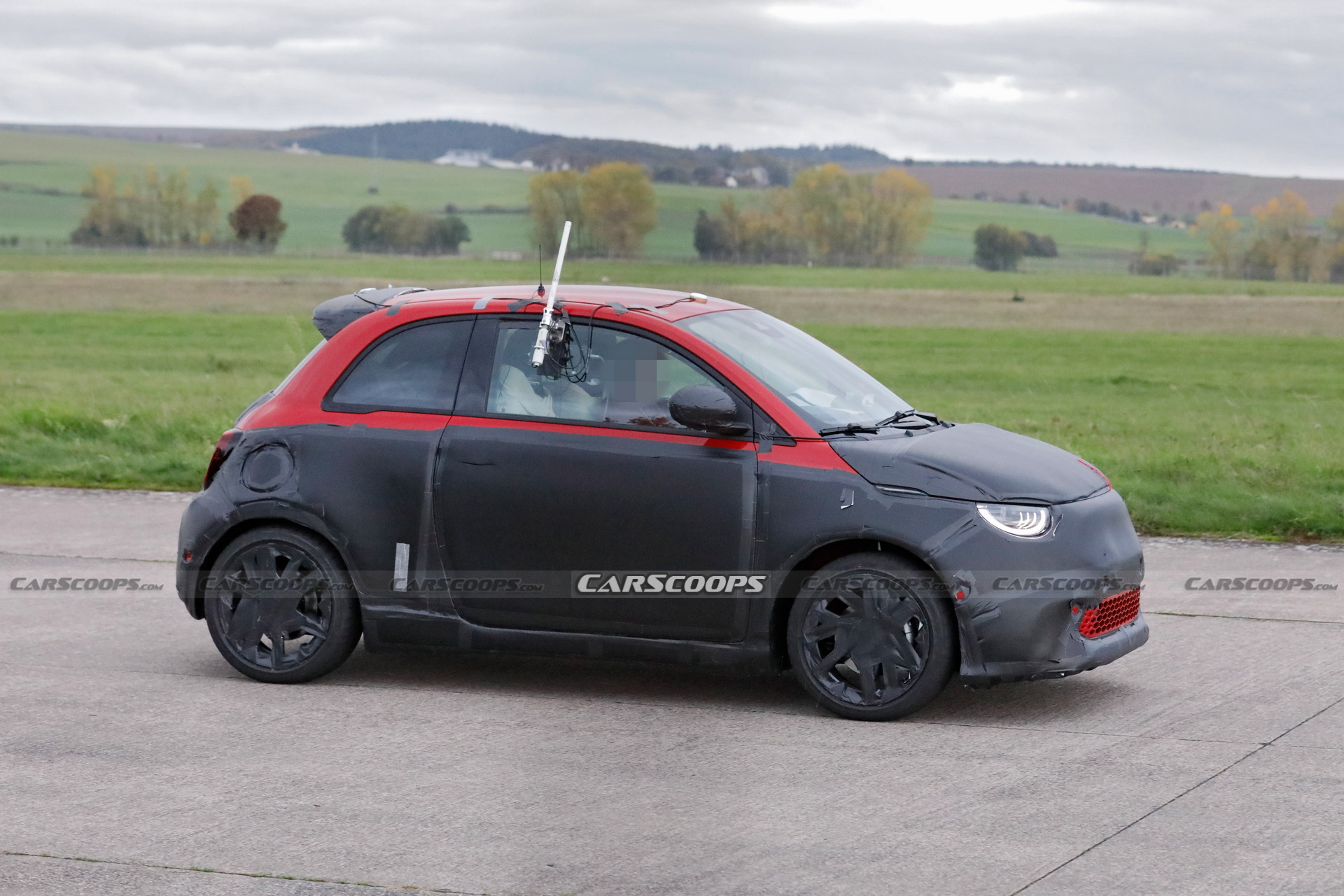 Abarth Version Of The Fiat 500 EV Spied Trying To Hide Its Redesigned Bodykit