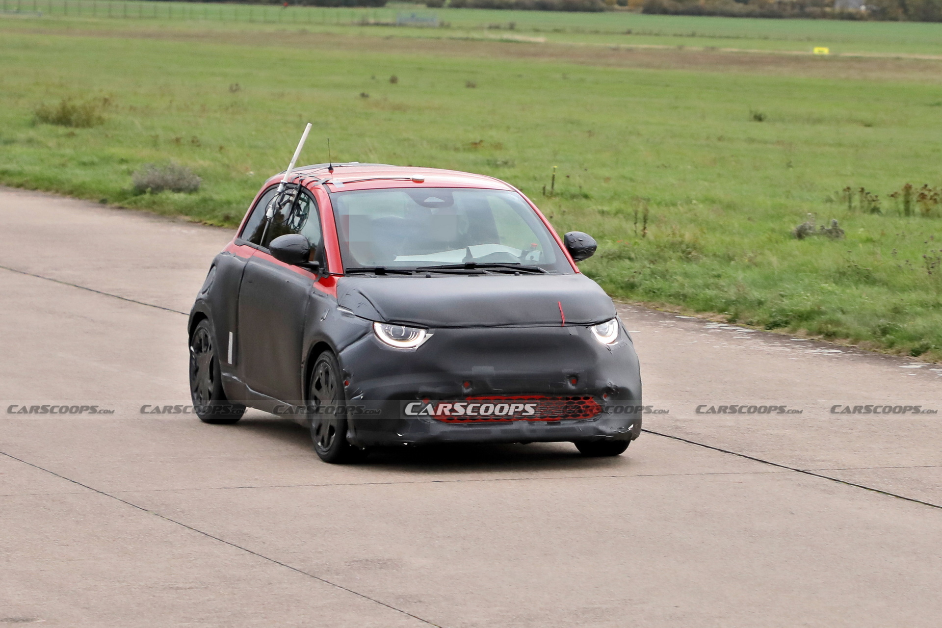 Abarth Version Of The Fiat 500 EV Spied Trying To Hide Its Redesigned Bodykit