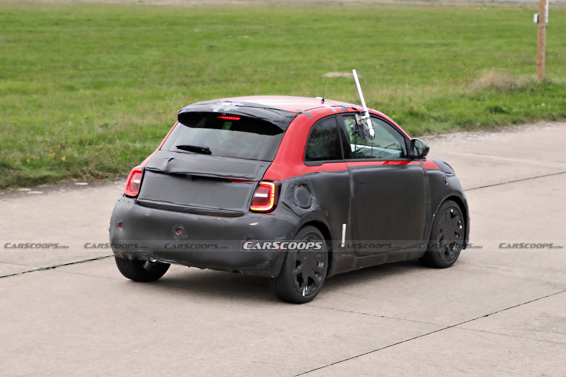 Abarth Version Of The Fiat 500 EV Spied Trying To Hide Its Redesigned Bodykit