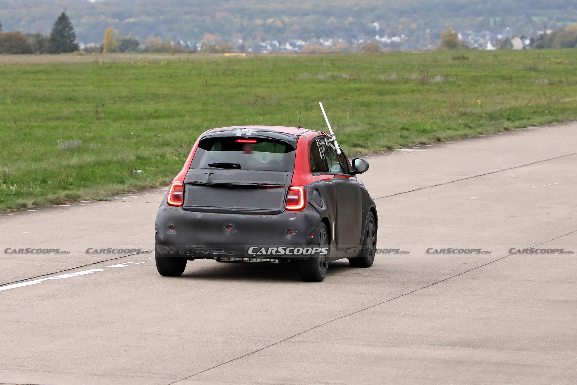 Abarth Version Of The Fiat 500 EV Spied Trying To Hide Its Redesigned Bodykit