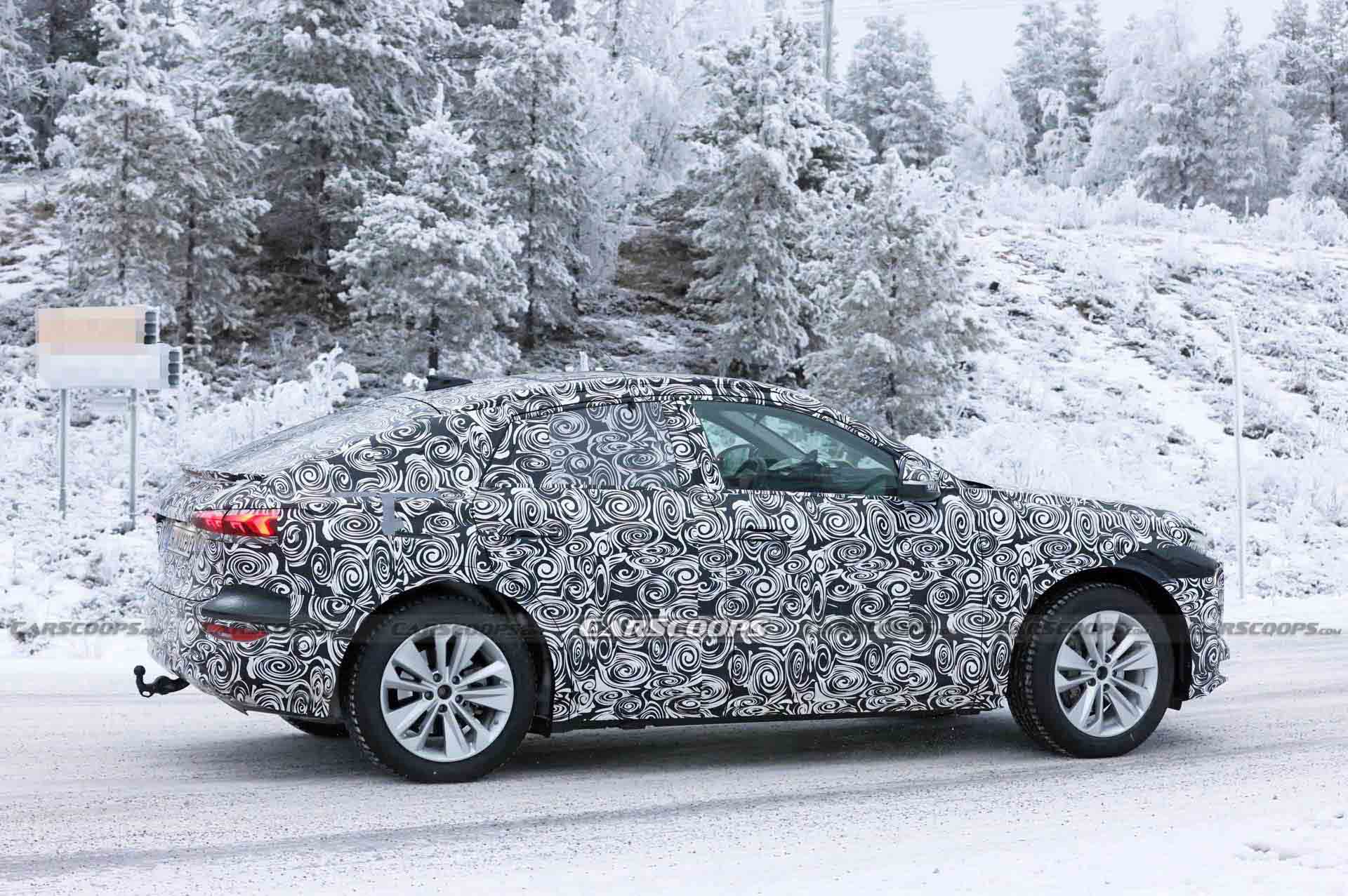 Audi Q6 E-Tron Sportback Prototype Papped Playing In The Snow