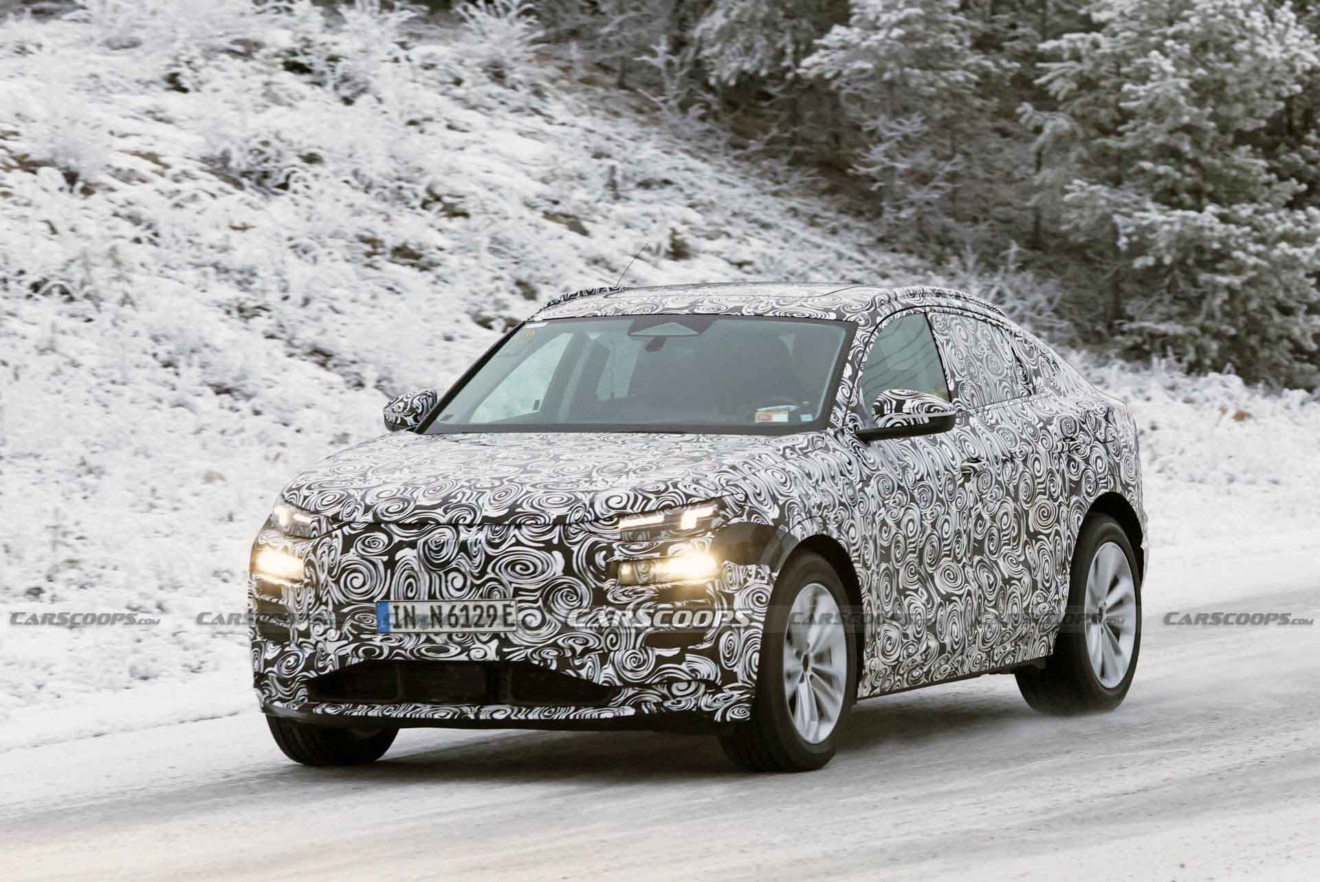 Audi Q6 E-Tron Sportback Prototype Papped Playing In The Snow