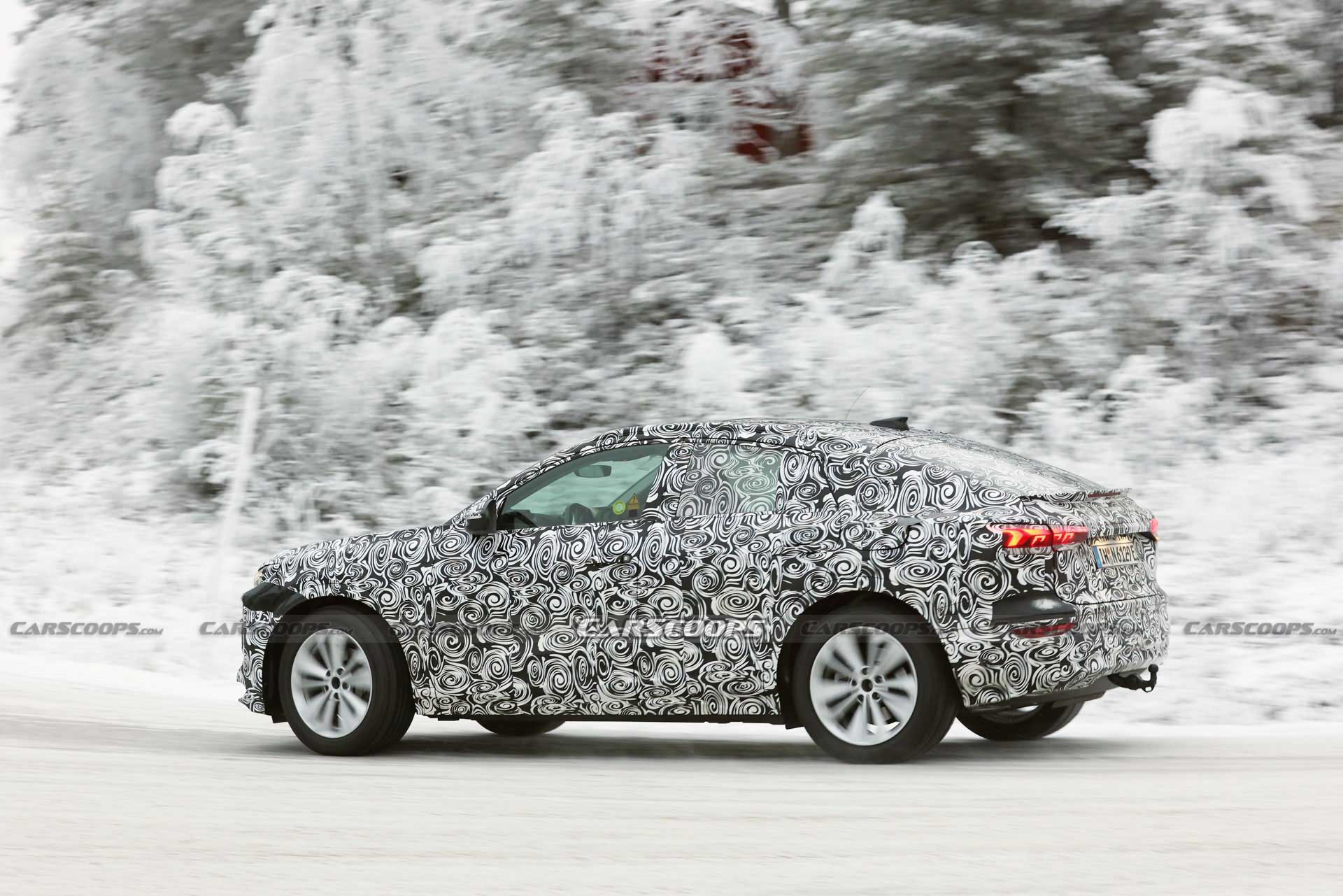 Audi Q6 E-Tron Sportback Prototype Papped Playing In The Snow