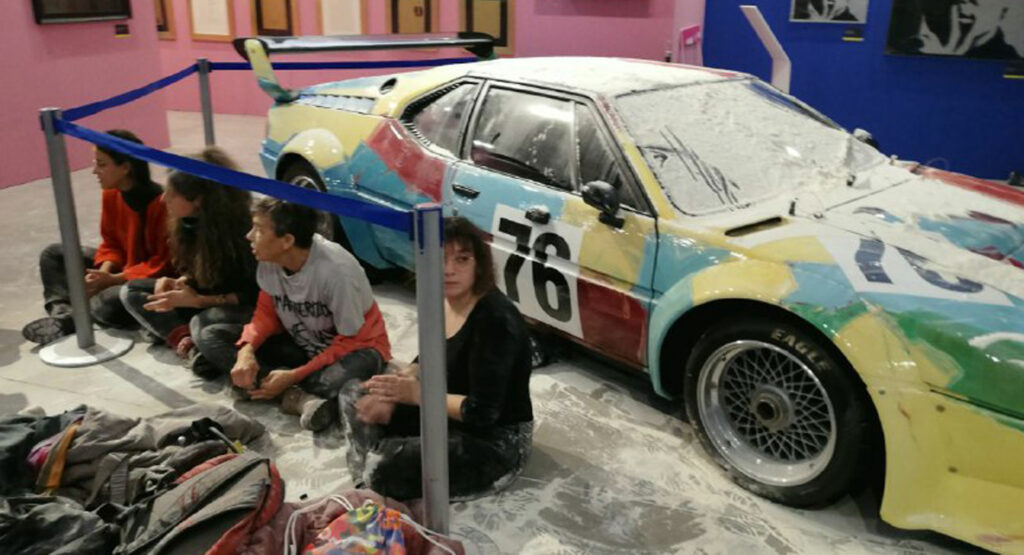  Climate Activists Pour Nearly 18 Lbs Of Flour On BMW M1 Painted By Andy Warhol