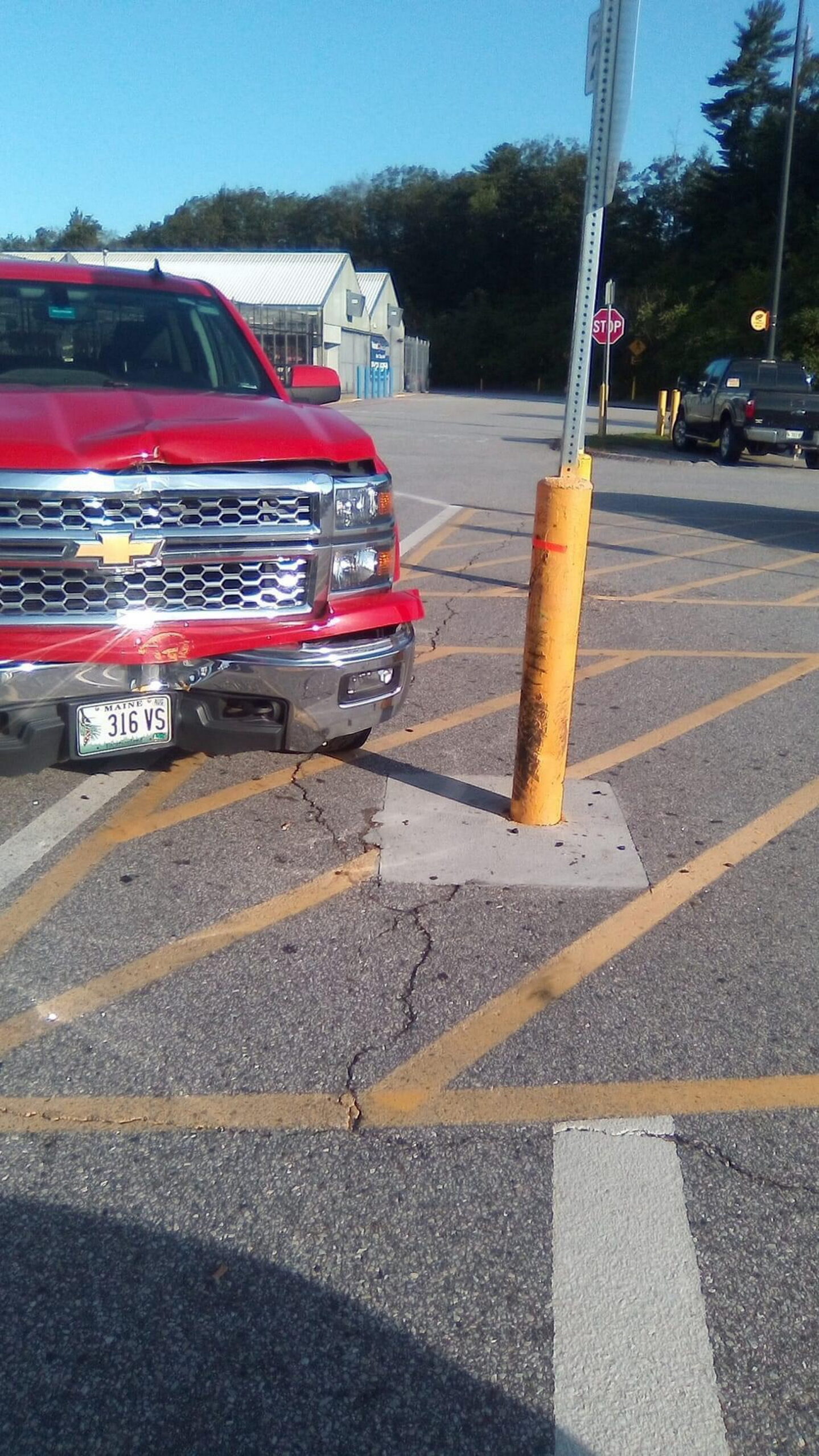 Move Over 11ft8 Bridge, This Walmart Parking Lot Pole Has Been Hit At Least 45 Times
