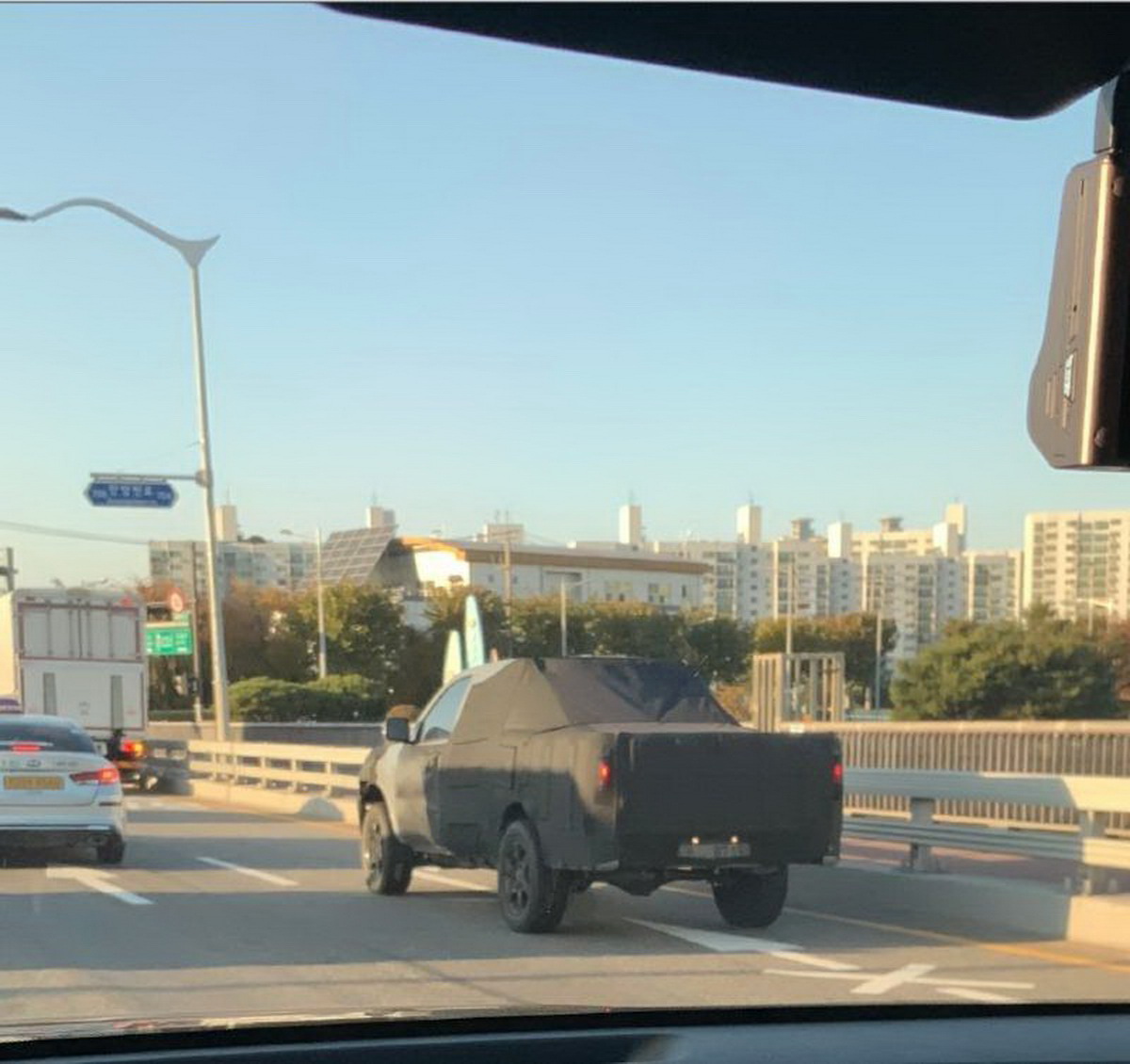 New Kia Pickup Truck Spied Wearing A Mohave Face
