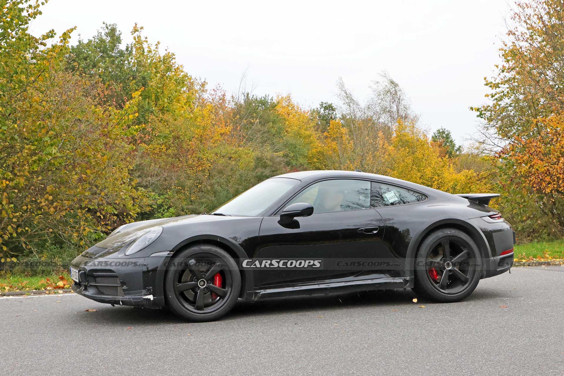 Do These New Spy Shots Reveal The Porsche 911 Dakar’s Air Suspension?