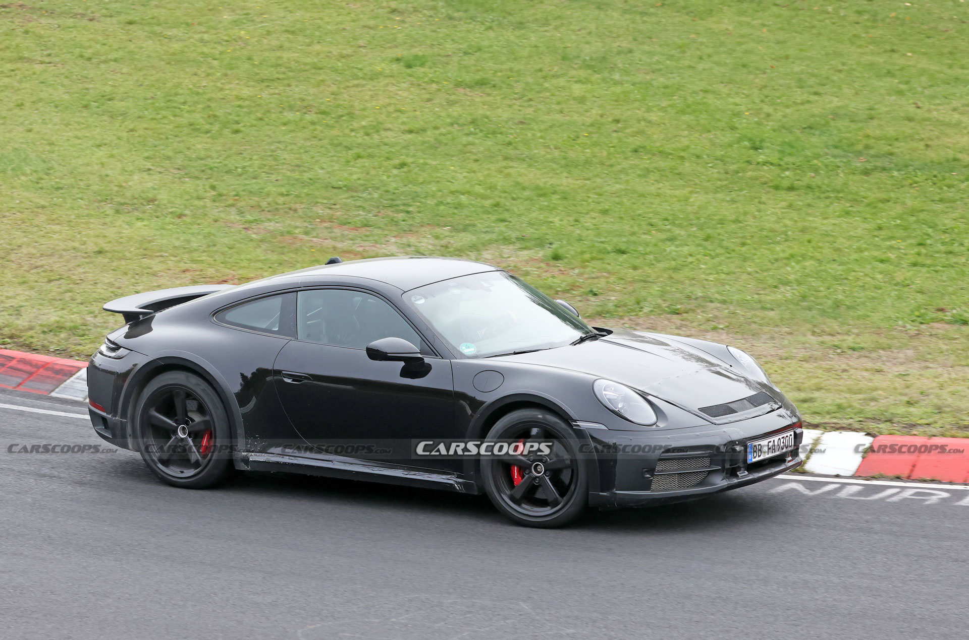 Do These New Spy Shots Reveal The Porsche 911 Dakar’s Air Suspension?