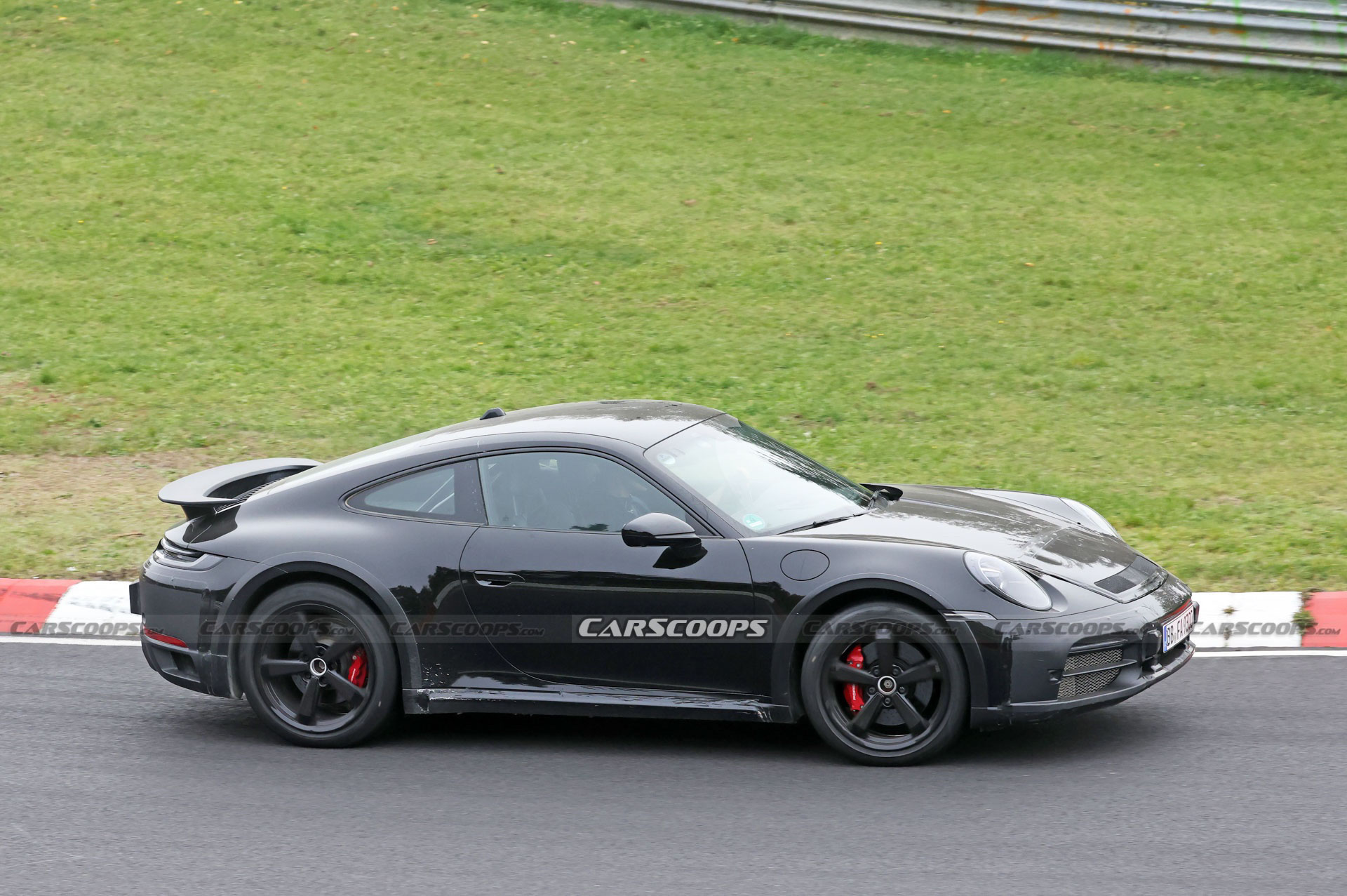 Do These New Spy Shots Reveal The Porsche 911 Dakar’s Air Suspension?