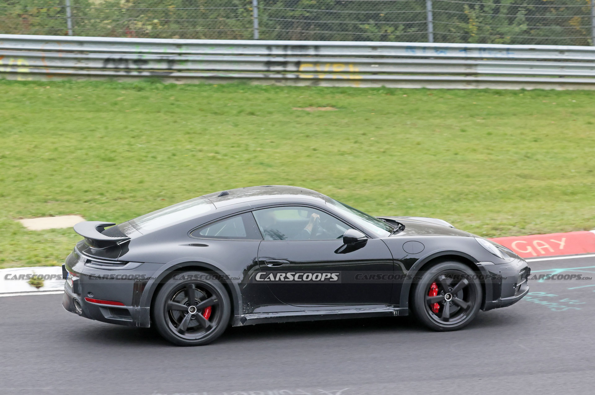 Do These New Spy Shots Reveal The Porsche 911 Dakar’s Air Suspension?