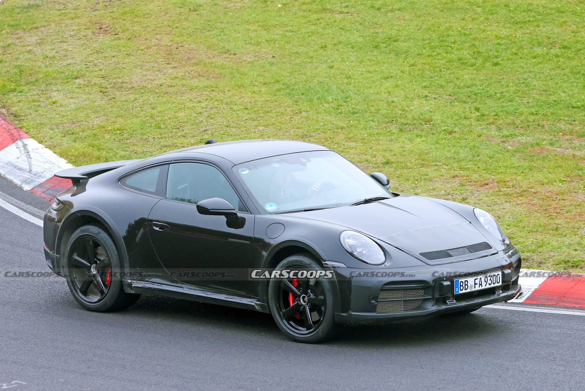 Do These New Spy Shots Reveal The Porsche 911 Dakar’s Air Suspension?