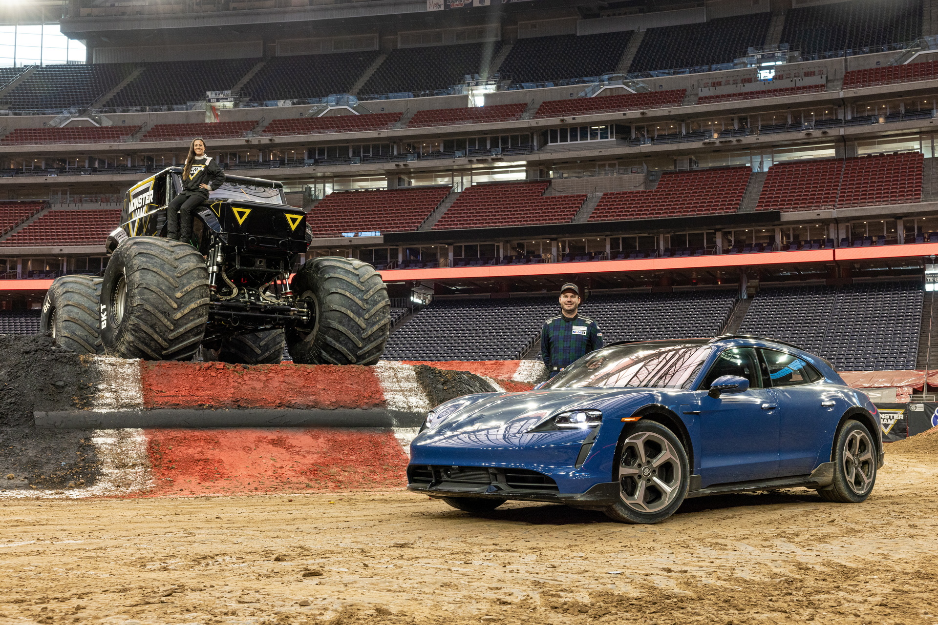 Watch A Monster Truck Flying Over A Porsche Taycan Cross Turismo
