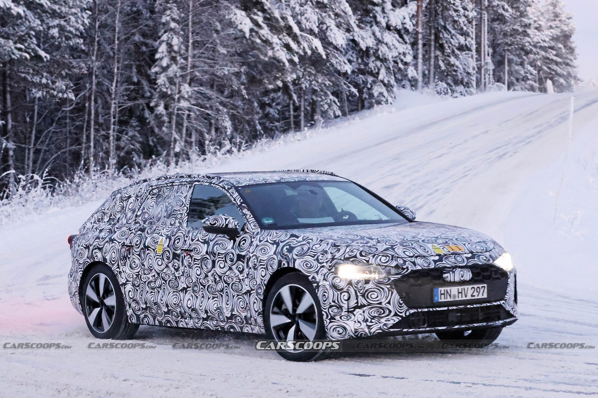 2024 Audi A4 Avant Spied With Plug-In Hybrid Powertrain And What Appears To Be A Massive Panoramic Glass Roof