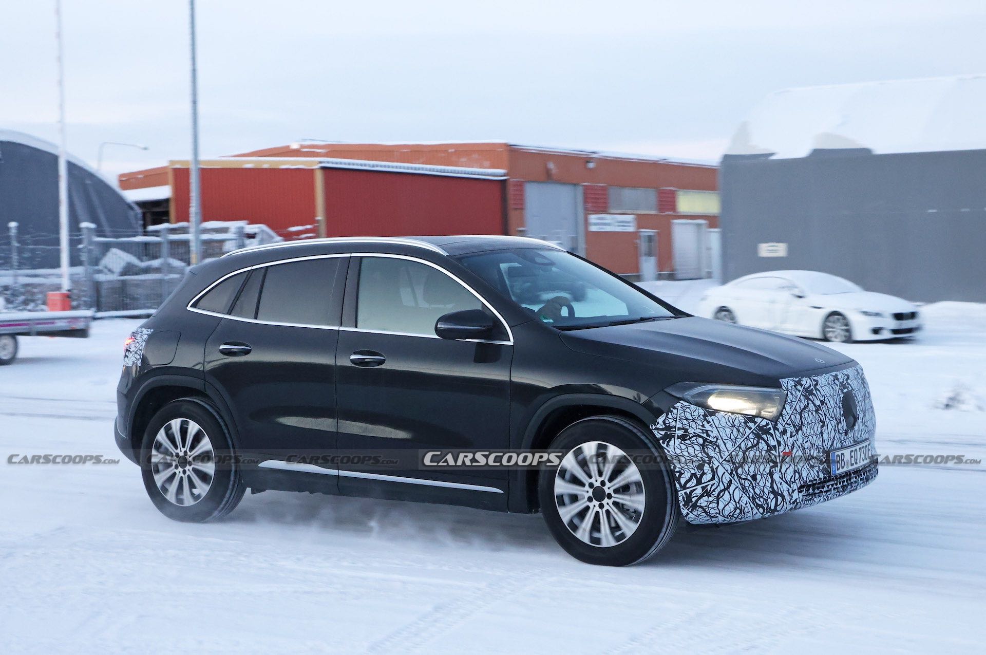 Facelifted Mercedes EQA Prototype Wears Camo Balaclava For Icy Winter Test