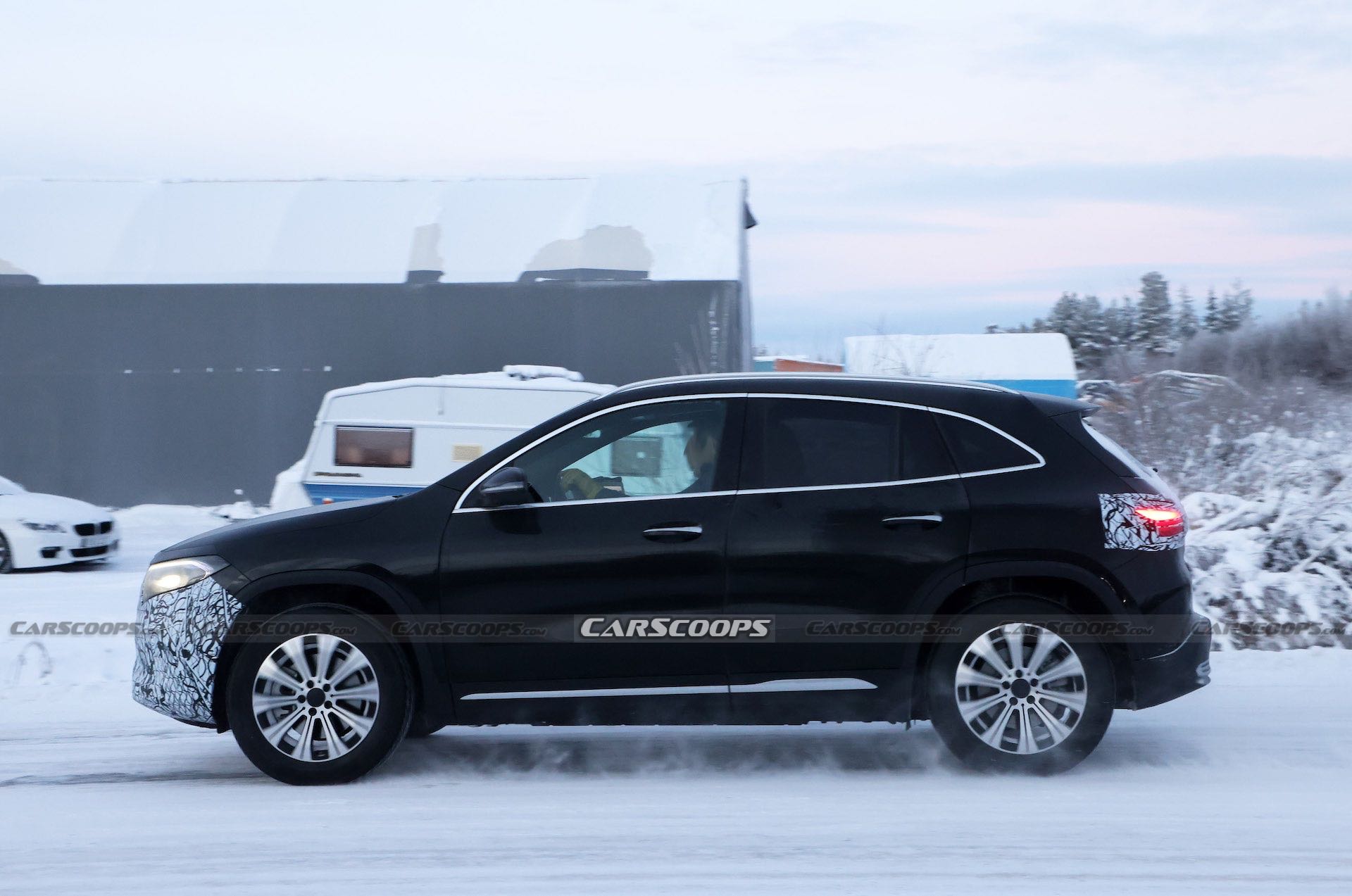 Facelifted Mercedes EQA Prototype Wears Camo Balaclava For Icy Winter Test