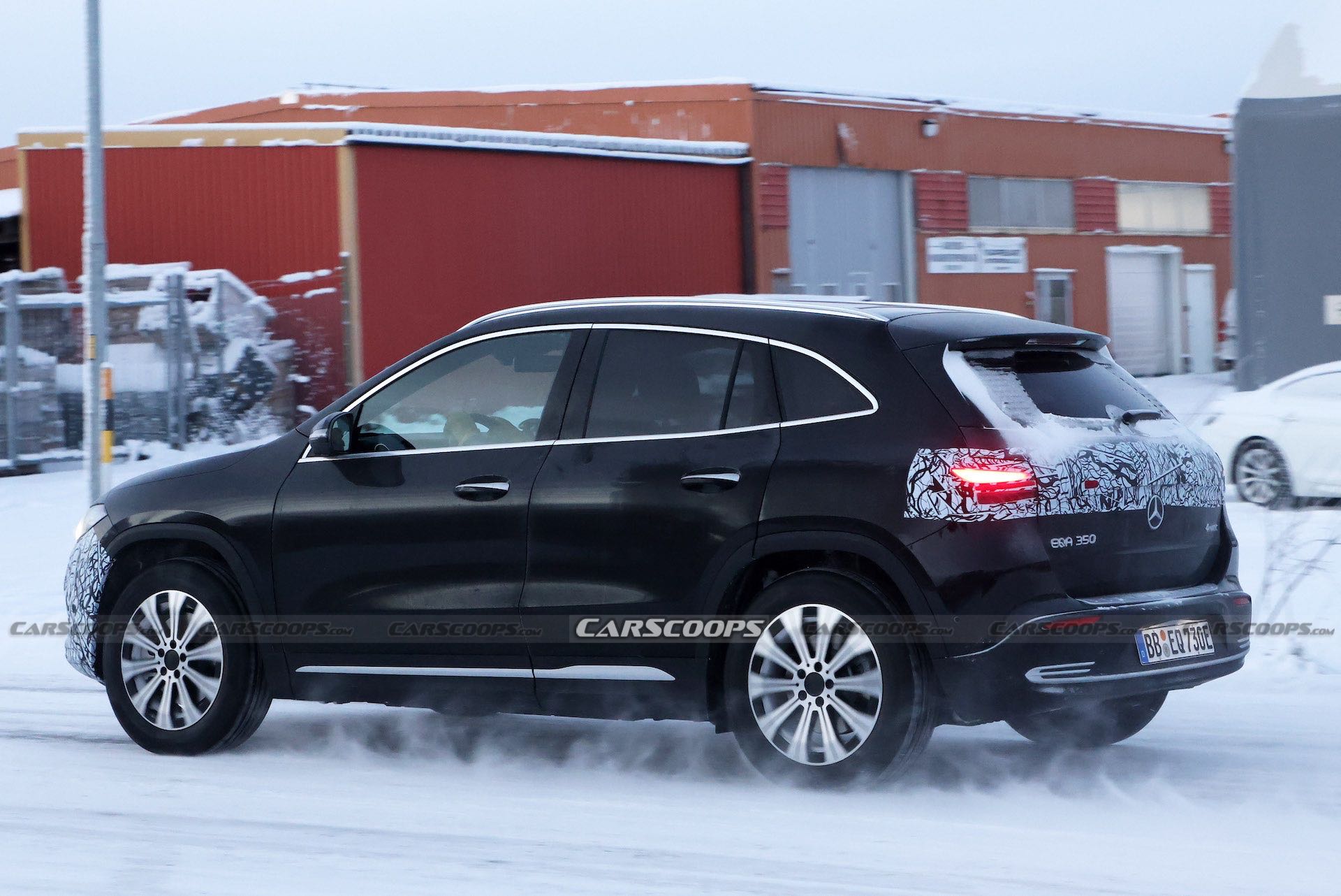 Facelifted Mercedes EQA Prototype Wears Camo Balaclava For Icy Winter Test