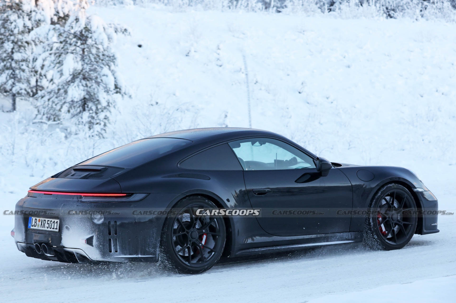 Facelifted 2024 Porsche 911 GT3, Touring And New ST Spotted Holding Their Own Winter Sports Festival