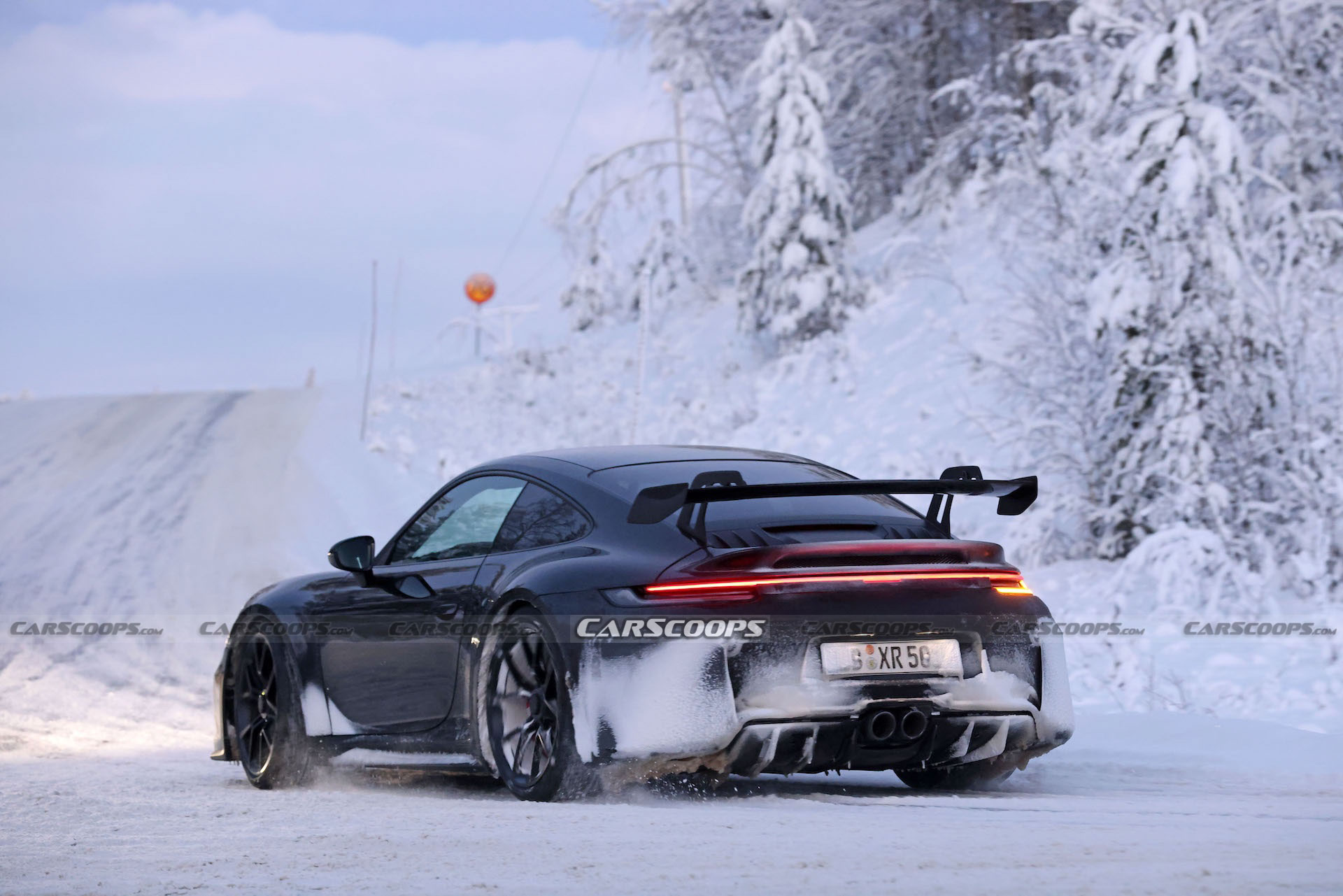Facelifted 2024 Porsche 911 GT3, Touring And New ST Spotted Holding Their Own Winter Sports Festival